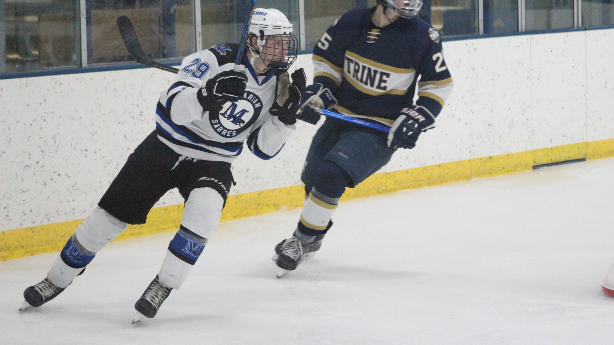 Adam Nobes tracks the puck.
