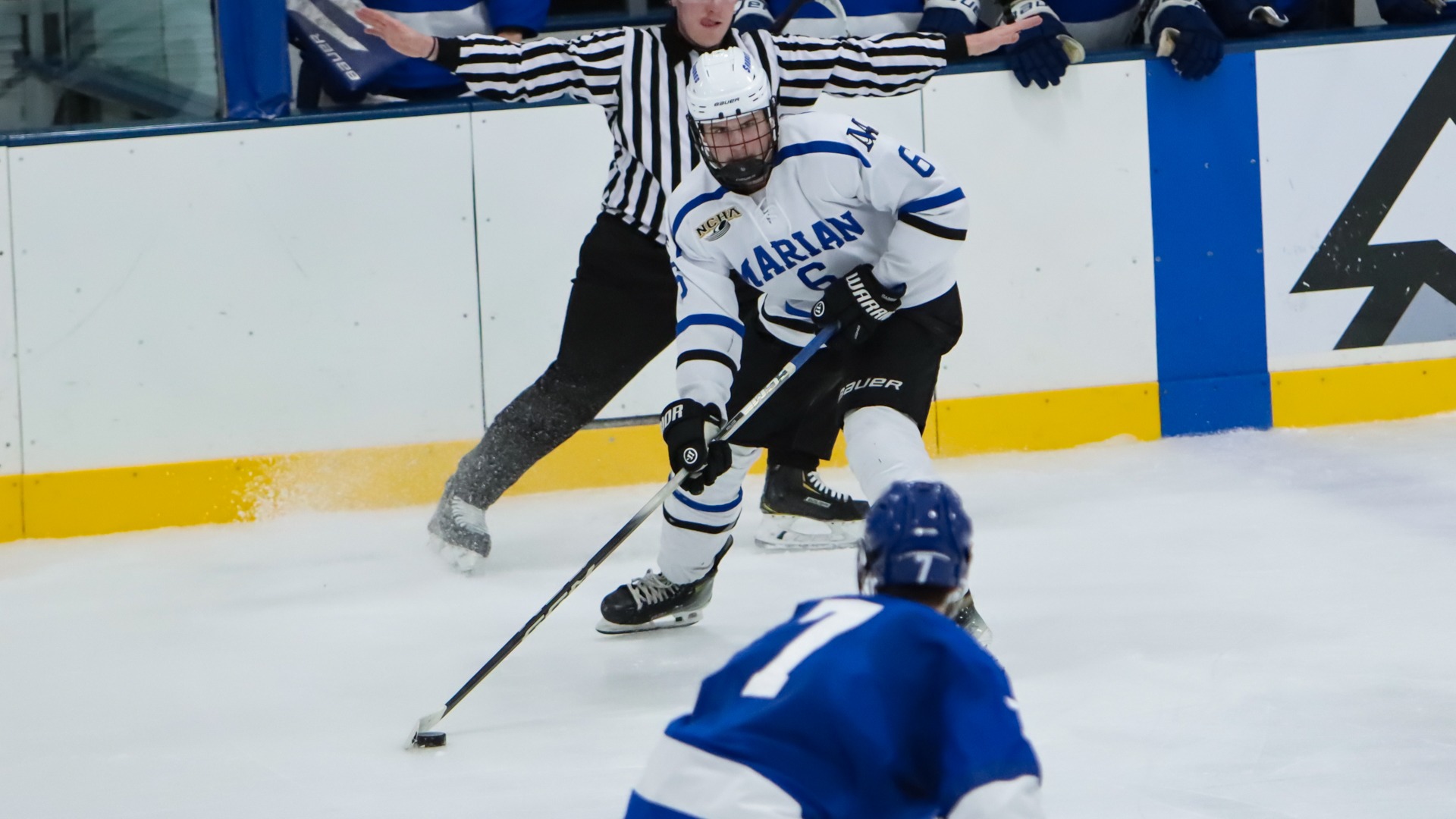 Brendan Bottem skates with the puck