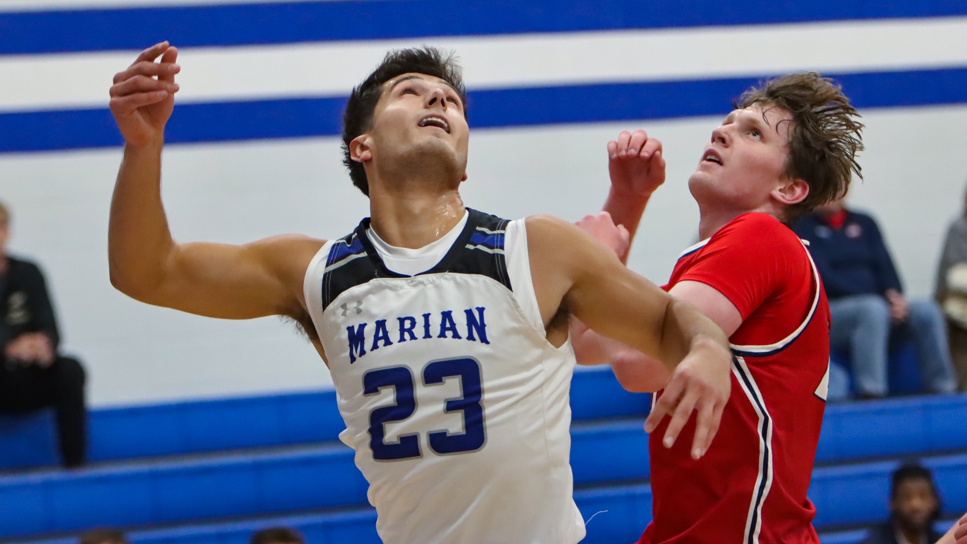 Derek Lindert drives to the basket