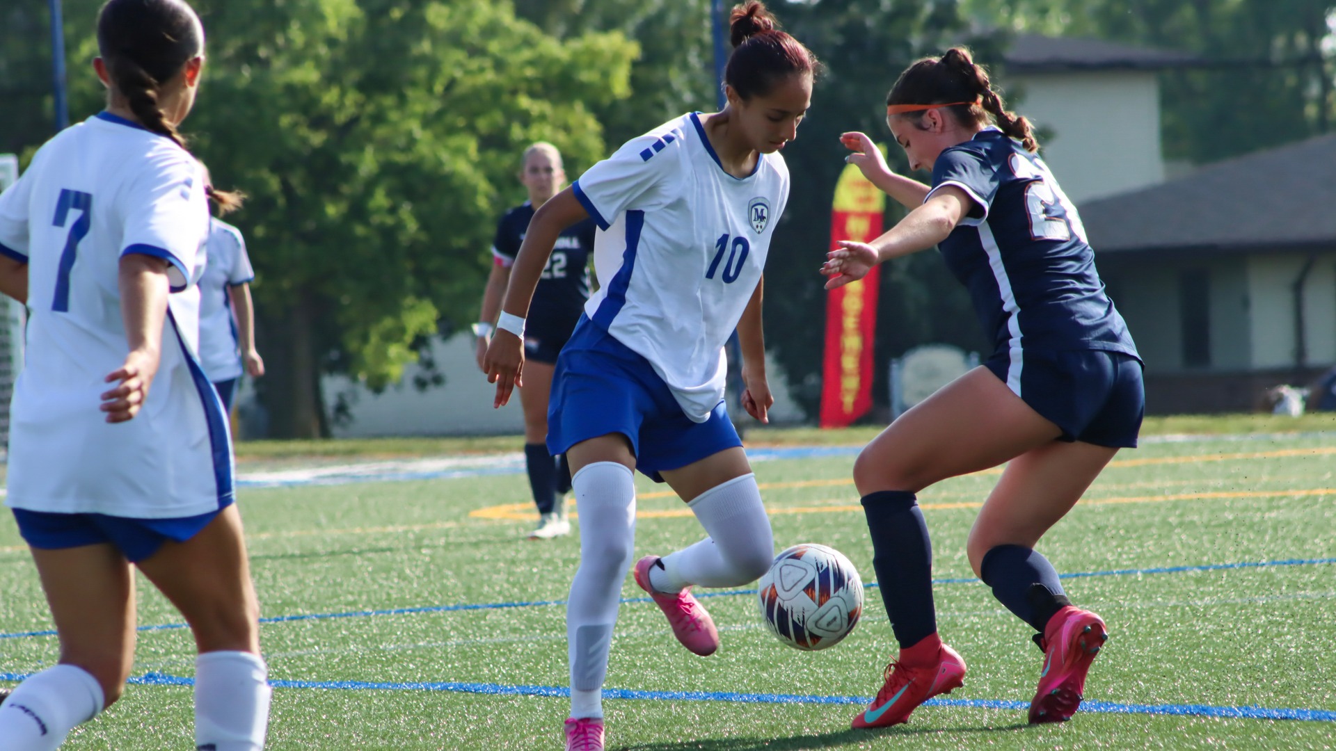 Emily Gordillo battles for the ball