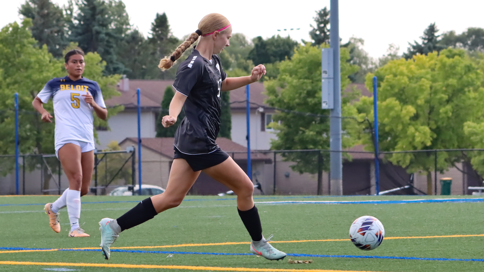 Anna Riley heads for the goal