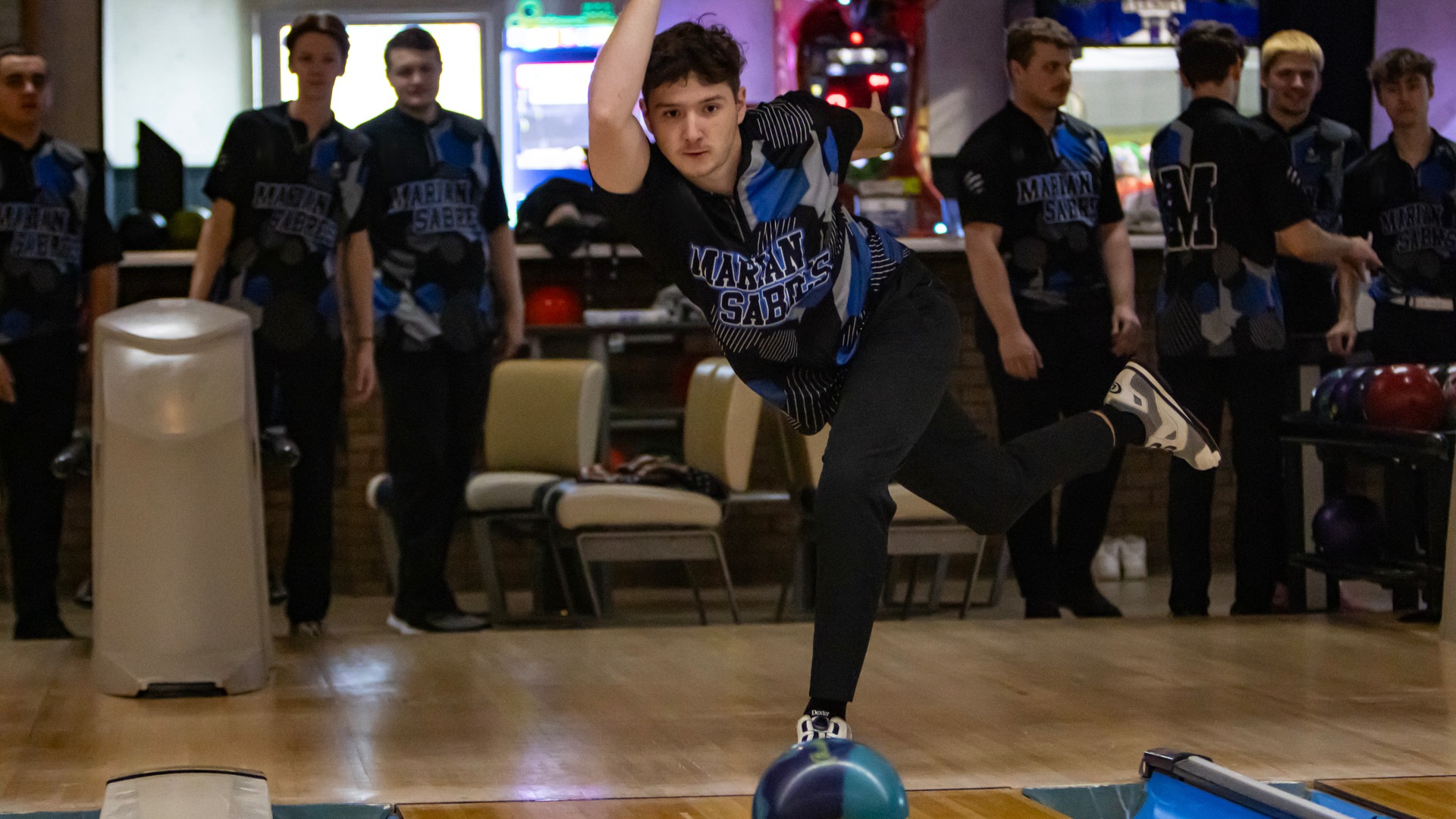 Aiden Scott bowls