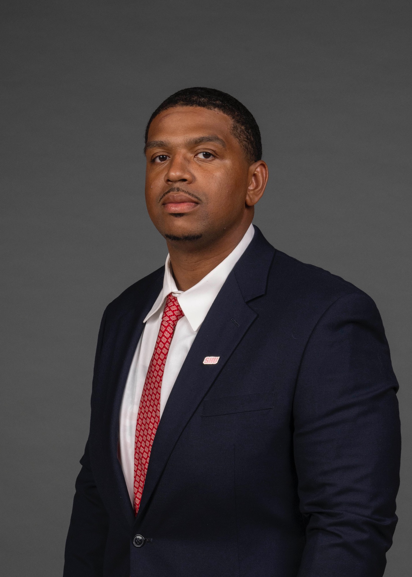 Coach Nigel Madison. The SHU Football team photos taken at the Bobby Valentine Recreation and Health Center, Sacred Heart University, Fairfield CT. Thursday, August 10, 2023. Photo by: Mark F. Conrad