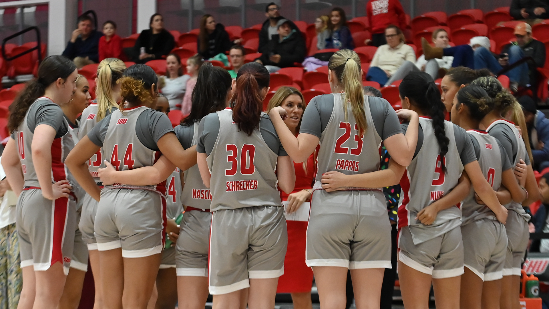 Women's Basketball Team Huddle