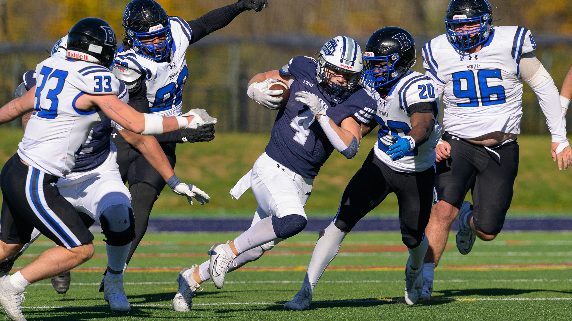 Jake Croce being chased by Bentley defenders