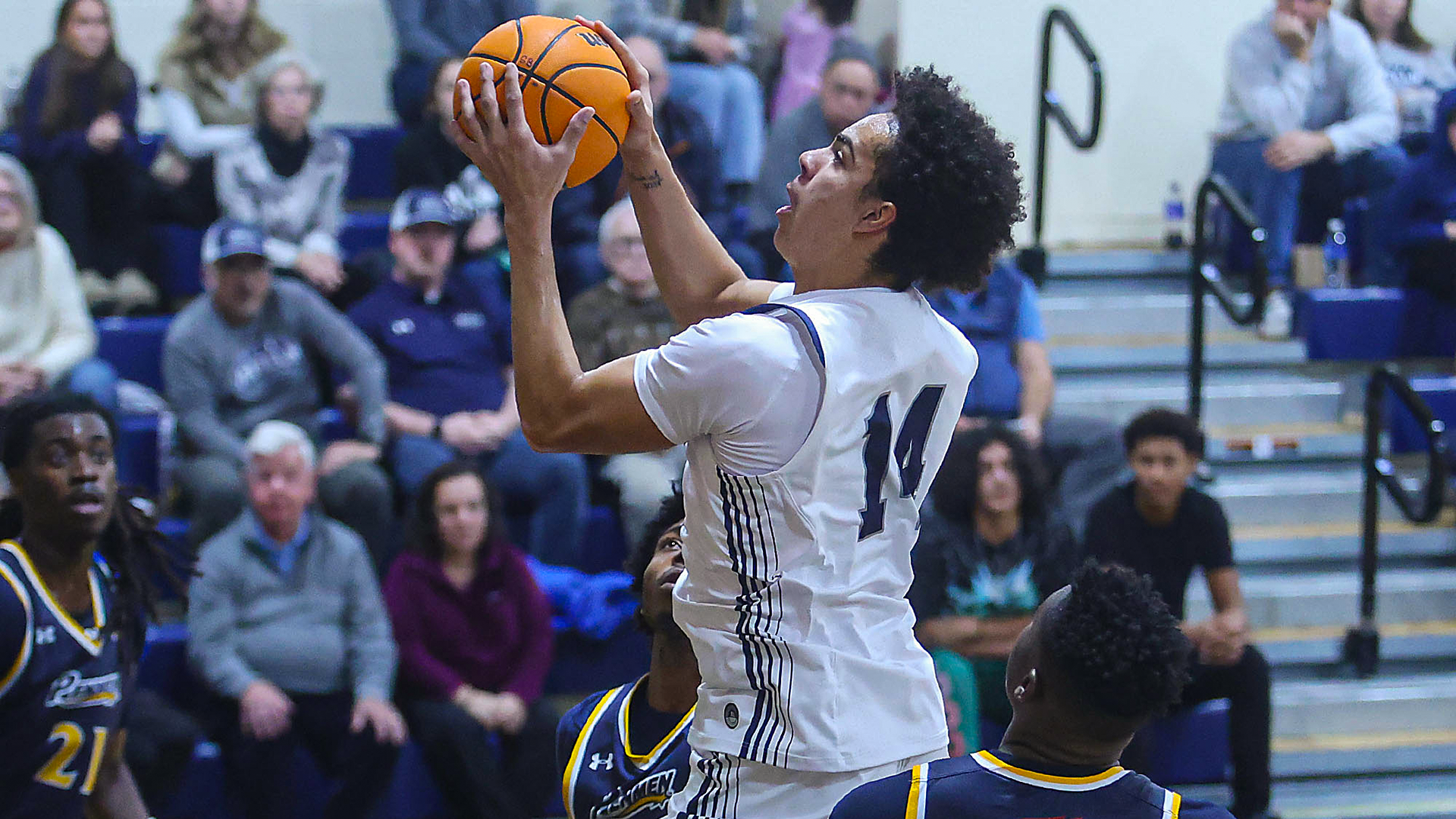 Hayden Johns attempts layup against SNHU