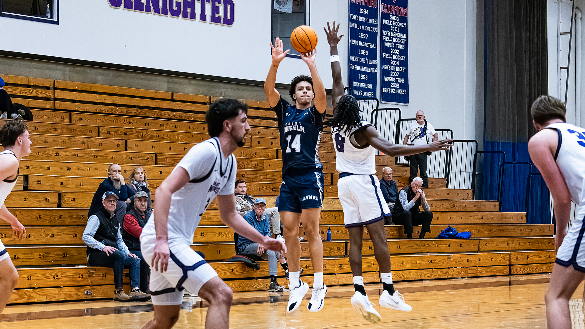 Hayden Johns attempts three-pointer at Saint Michael's