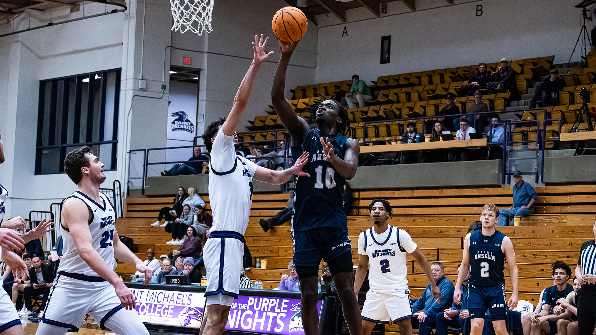Edward Onyia finishes layup at Saint Michael's