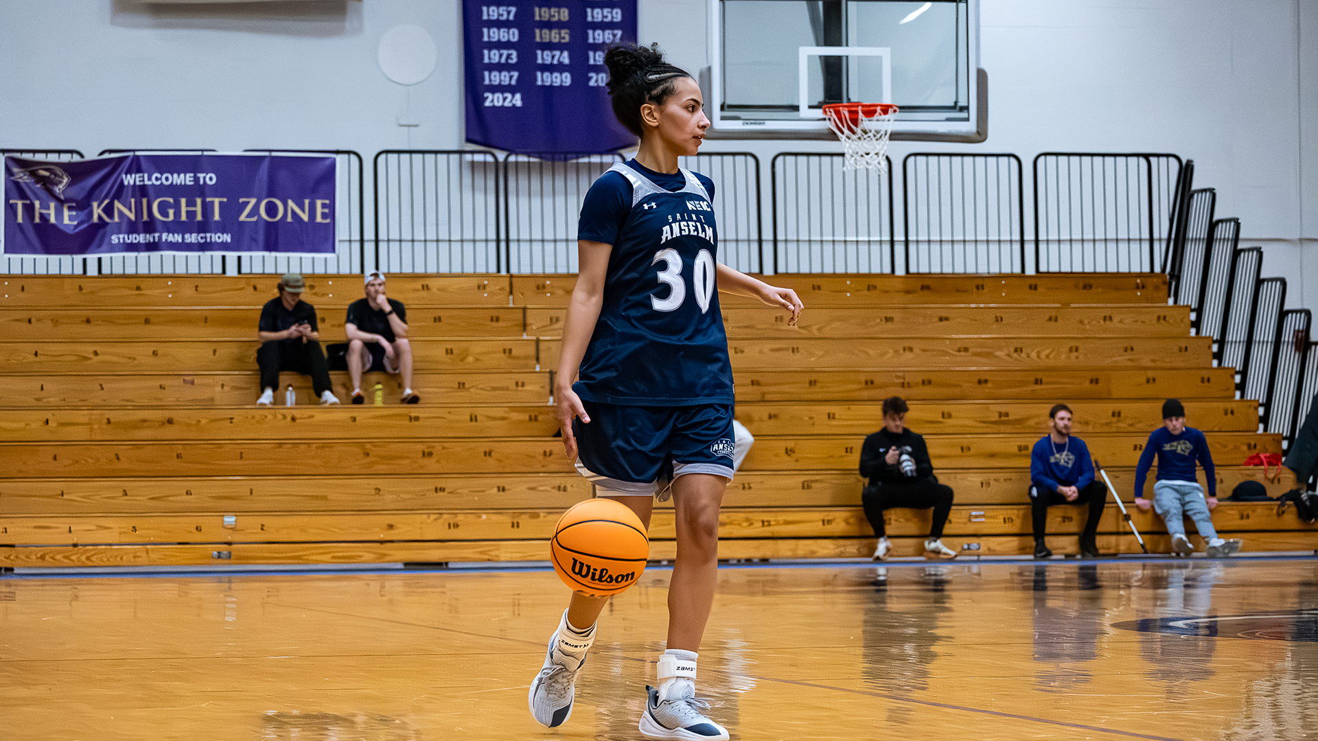 Tatum Forbes bringing up the ball at Saint Michael's College