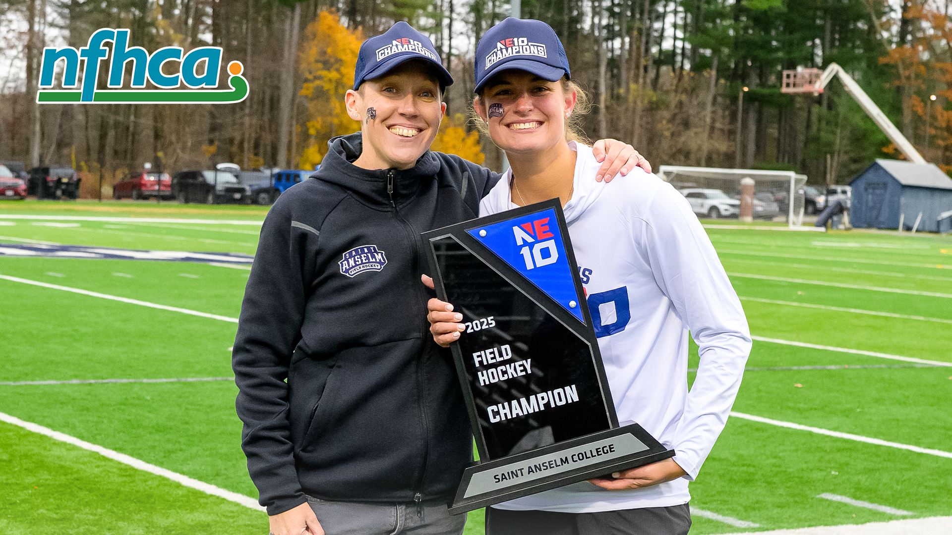 King-Robitaille and Mawn pose with trophy