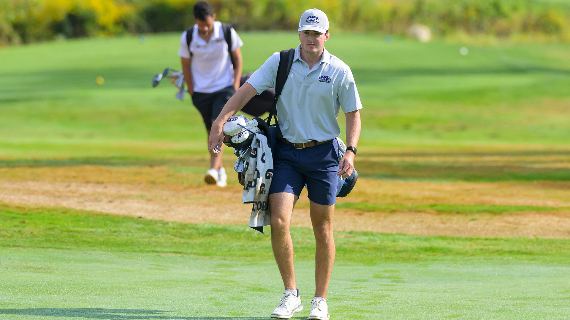 Brady Warren walking the course at Granite State Opener