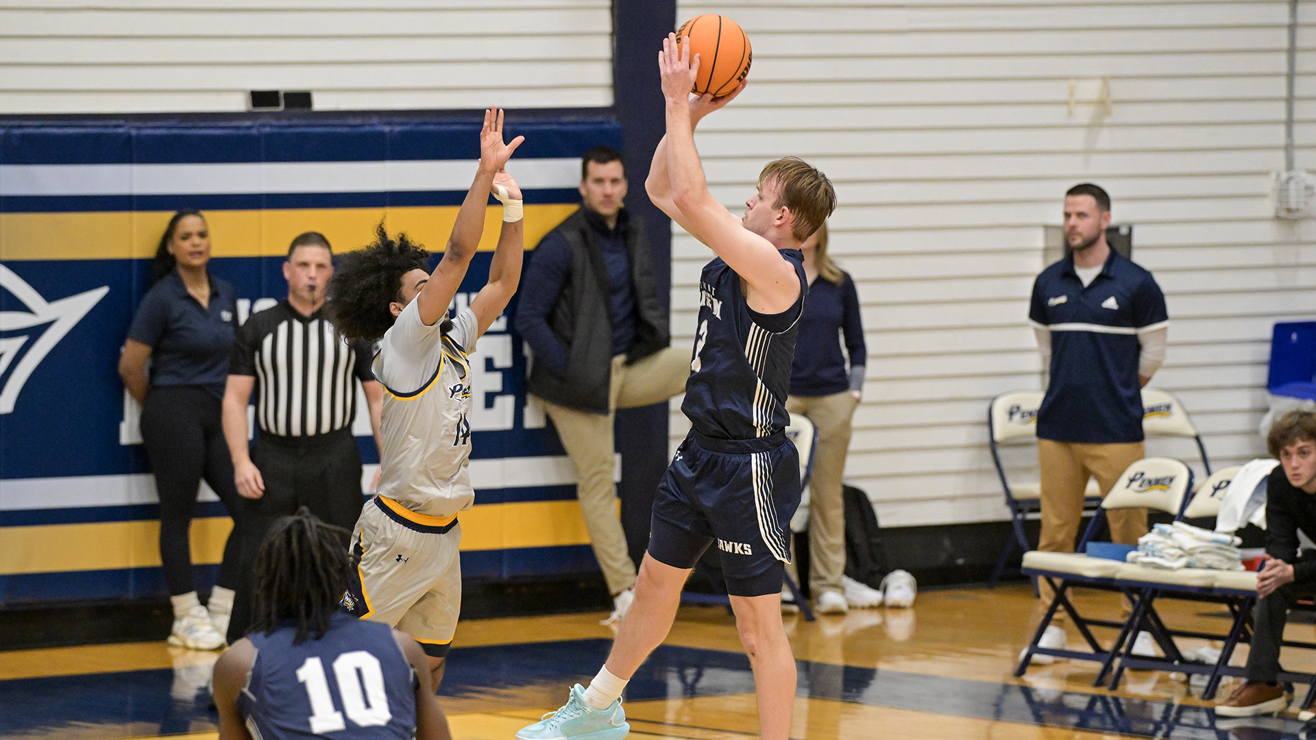 Josh Morissette attempts jumper over defender at SNHU
