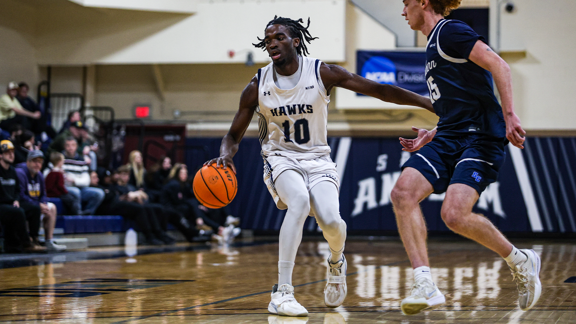 Edward Onyia dribbles the ball against SCSU