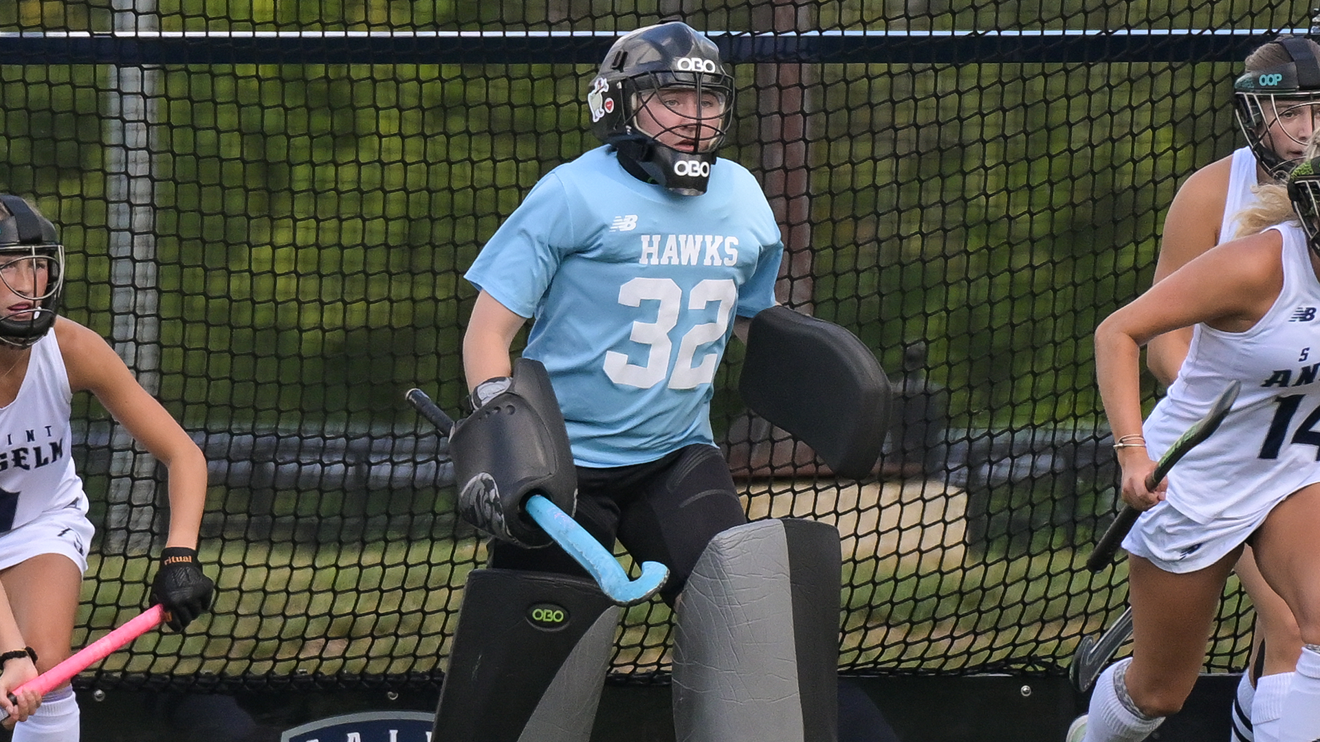 Mack Wherum defends the goal on a penalty corner. 