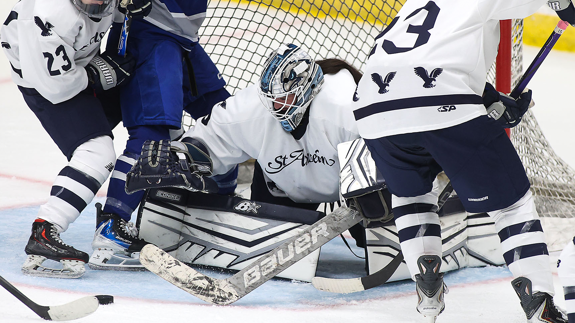 Kalyssa Bayne prepares to make one of 76 saves in record-setting performance in collegiate opener