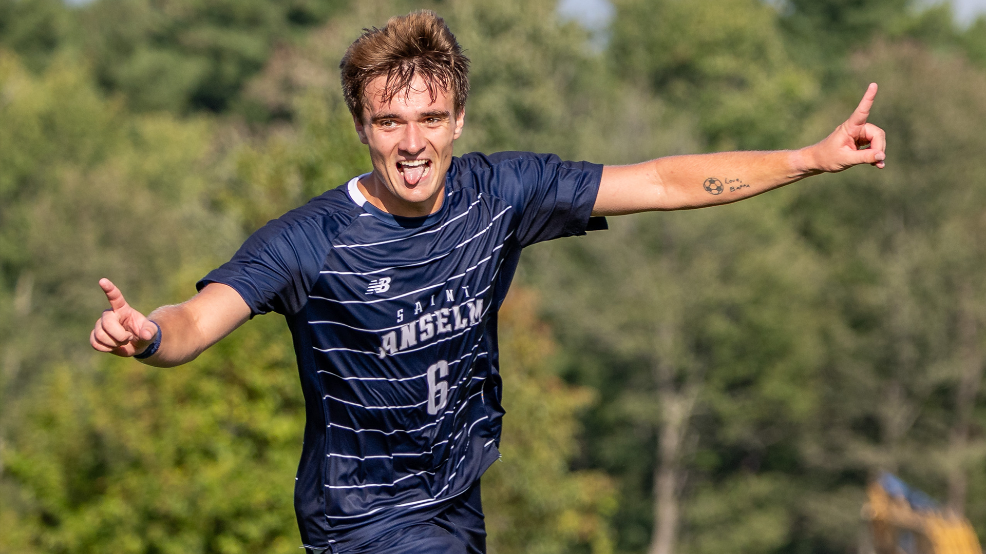 Brian Jones celebrates after scoring a goal. 