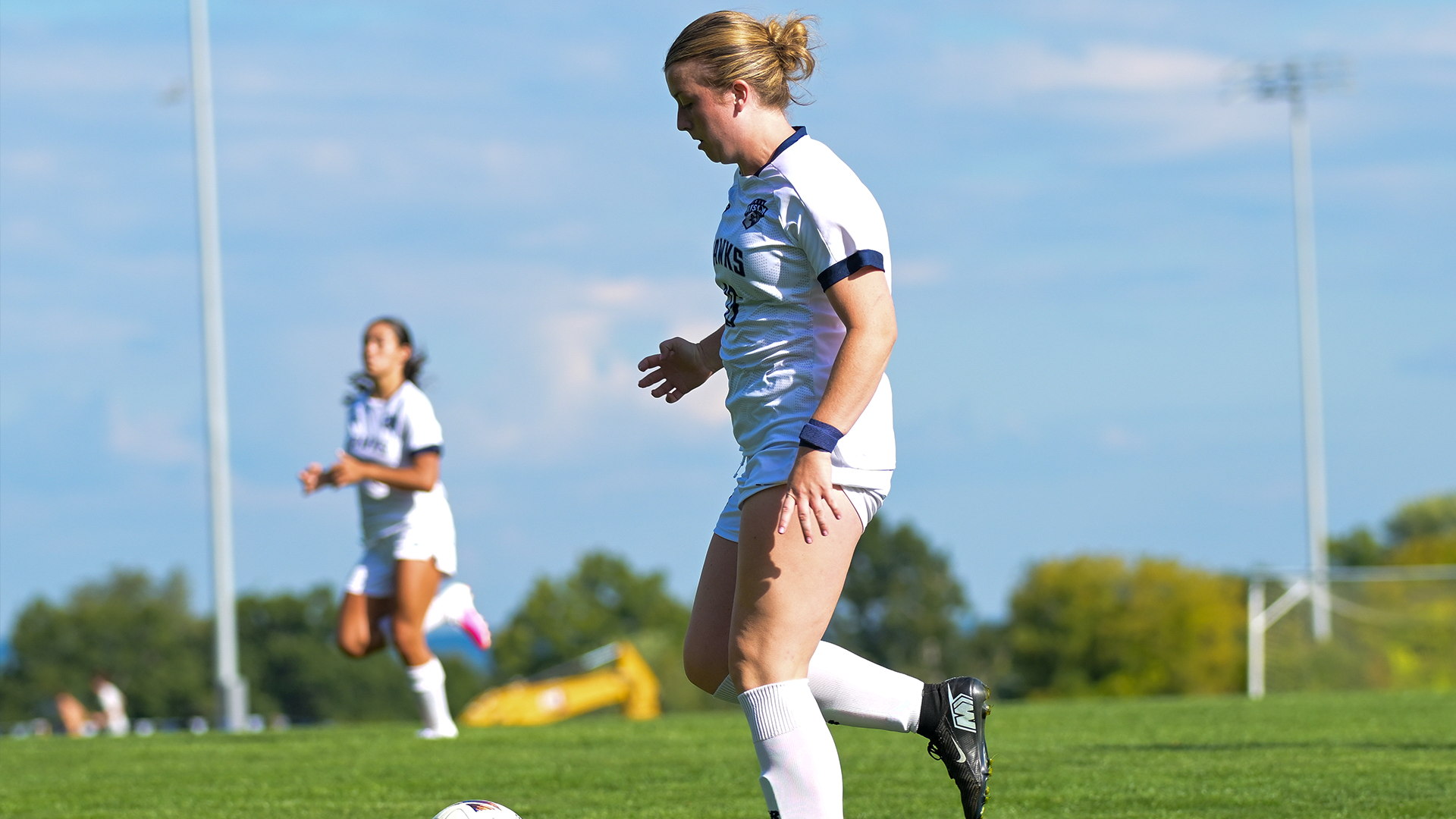 Addy Jerome runs with the ball. 