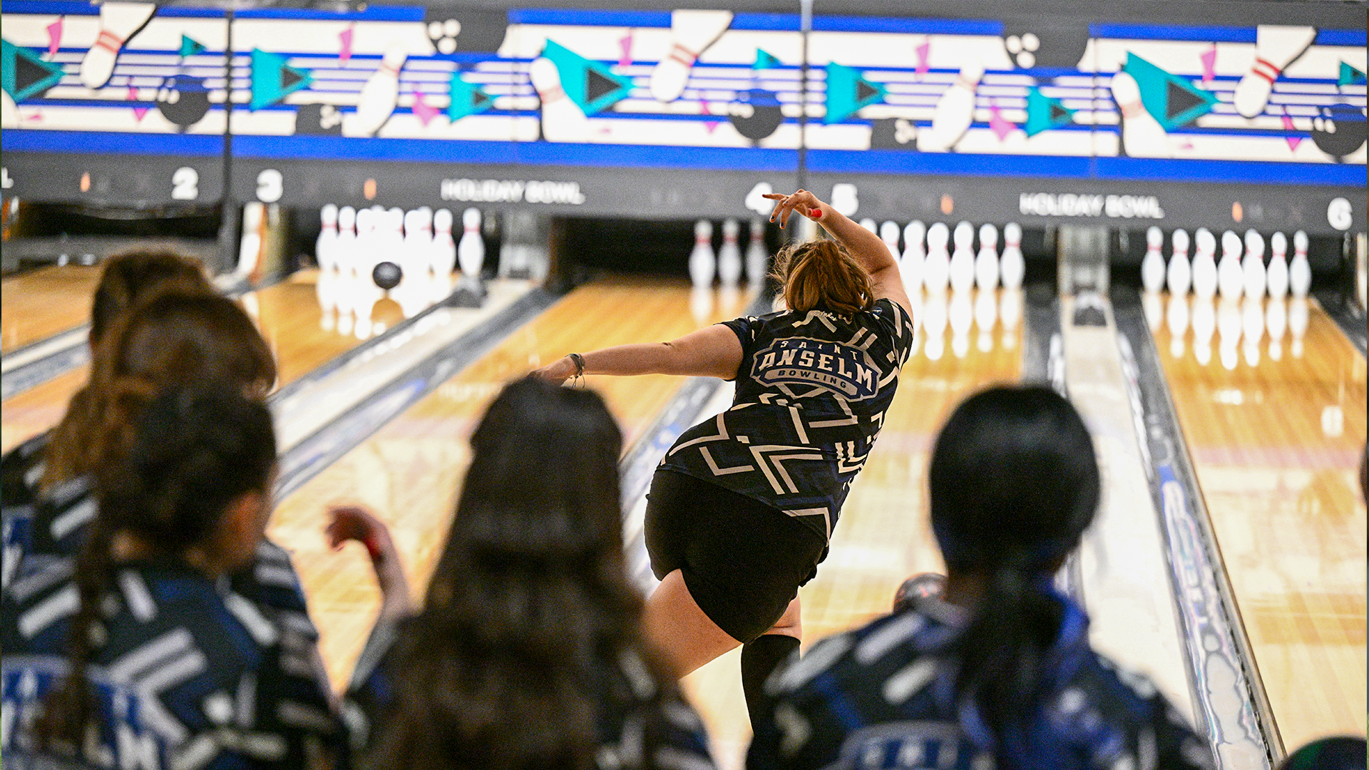 Katy McNemar follows through on a shot during competition. 