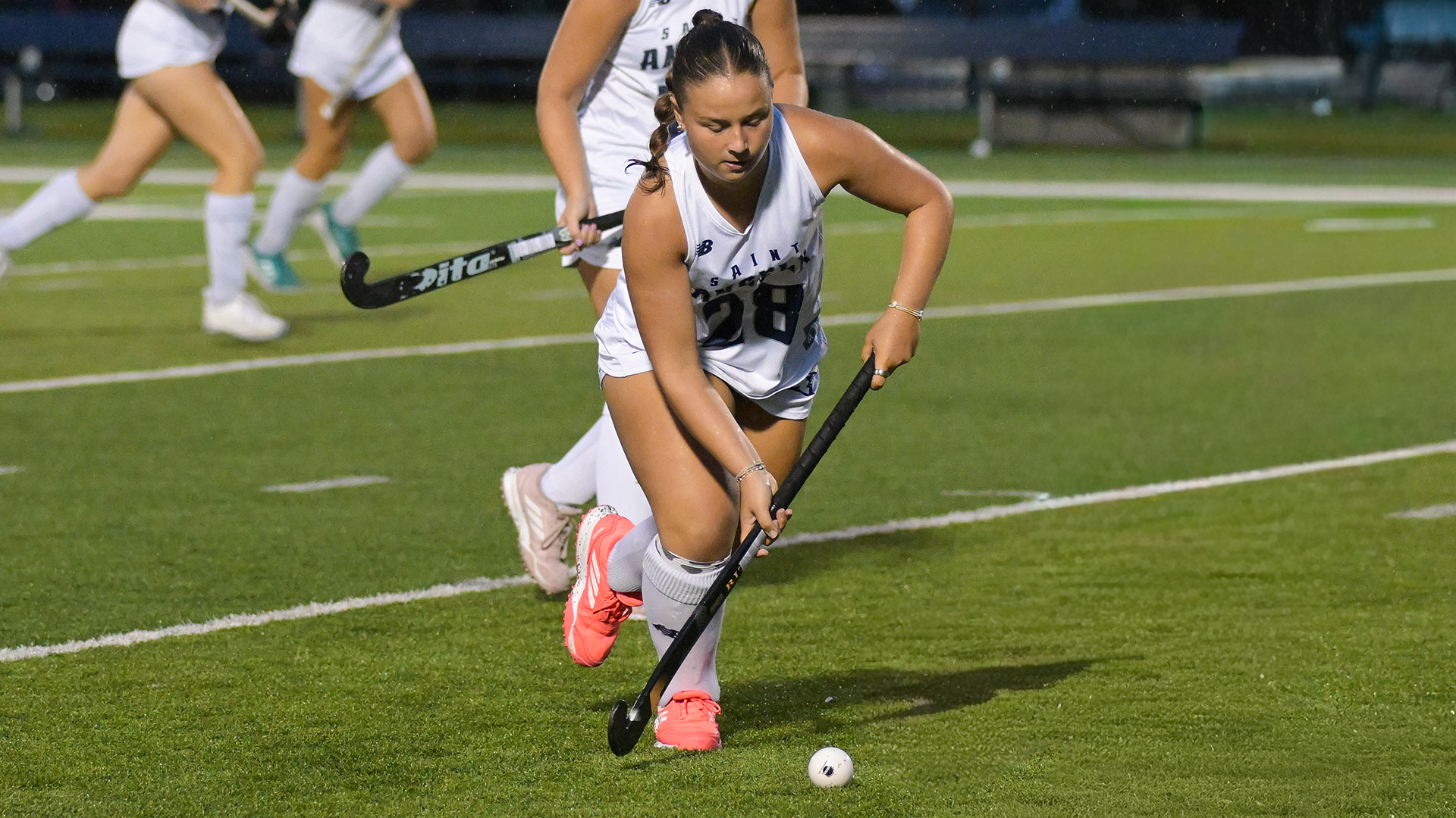 DiFiore running with the ball up the field. 