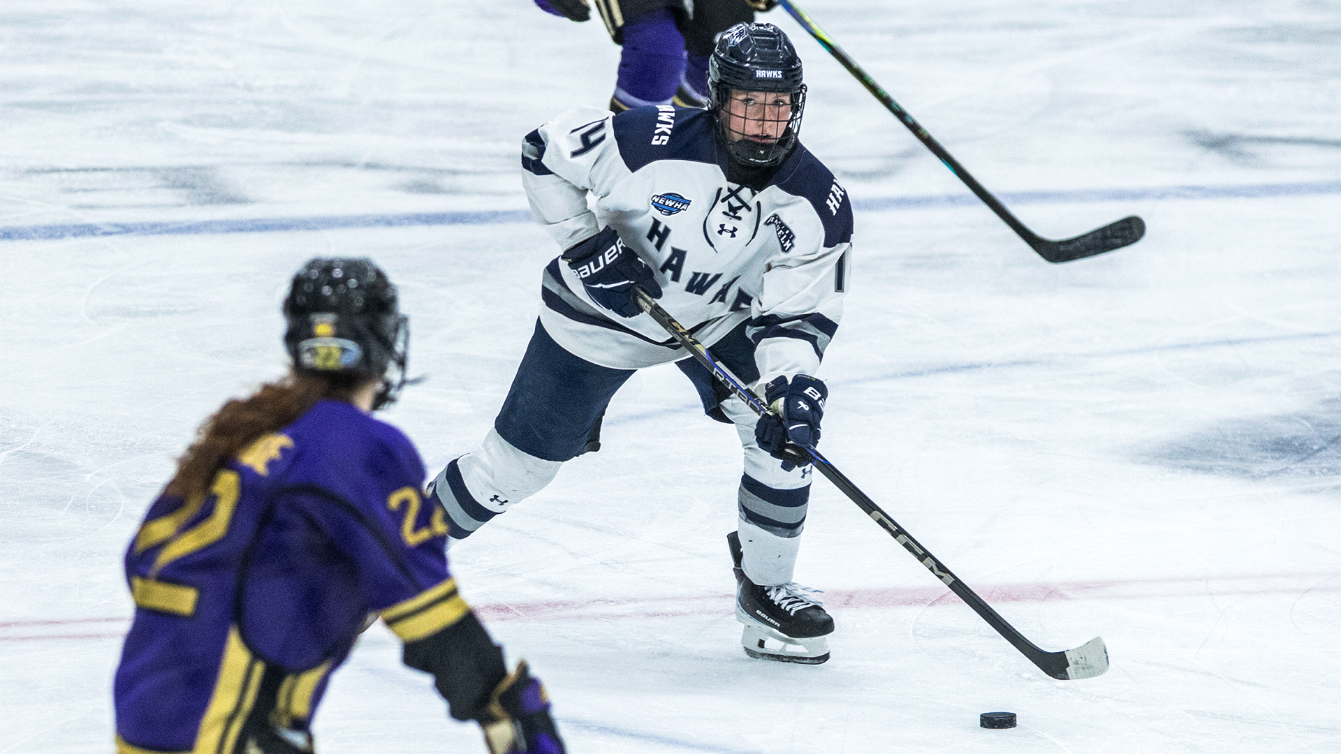 Forth skates into offensive zone with puck