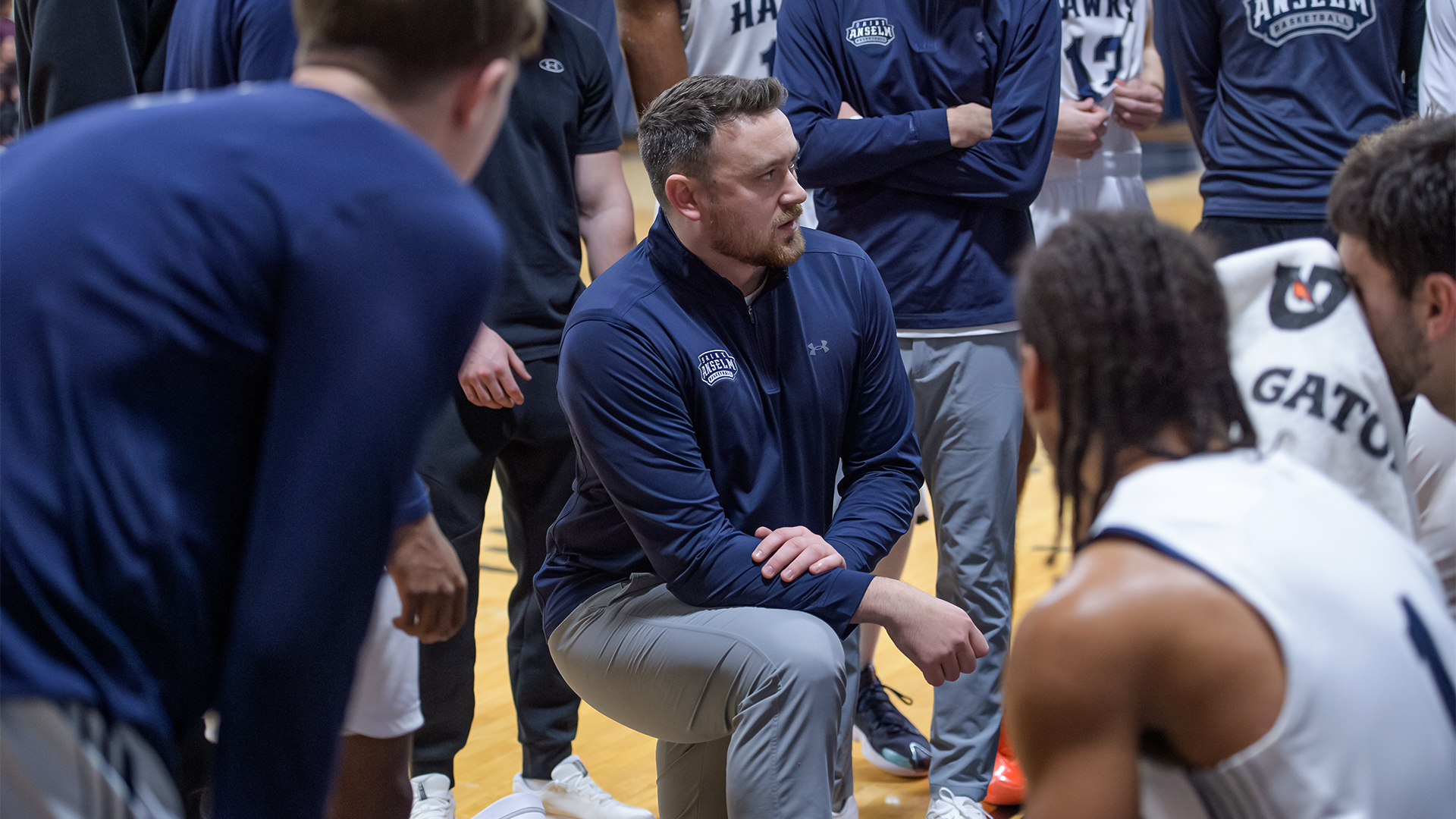 Coach Santo in the huddle