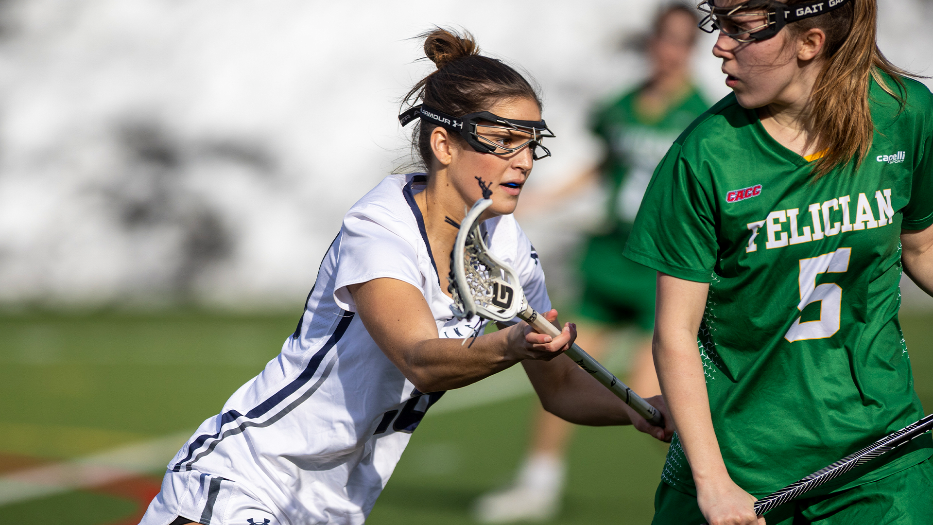 Elyse Scales plays defense against opponent