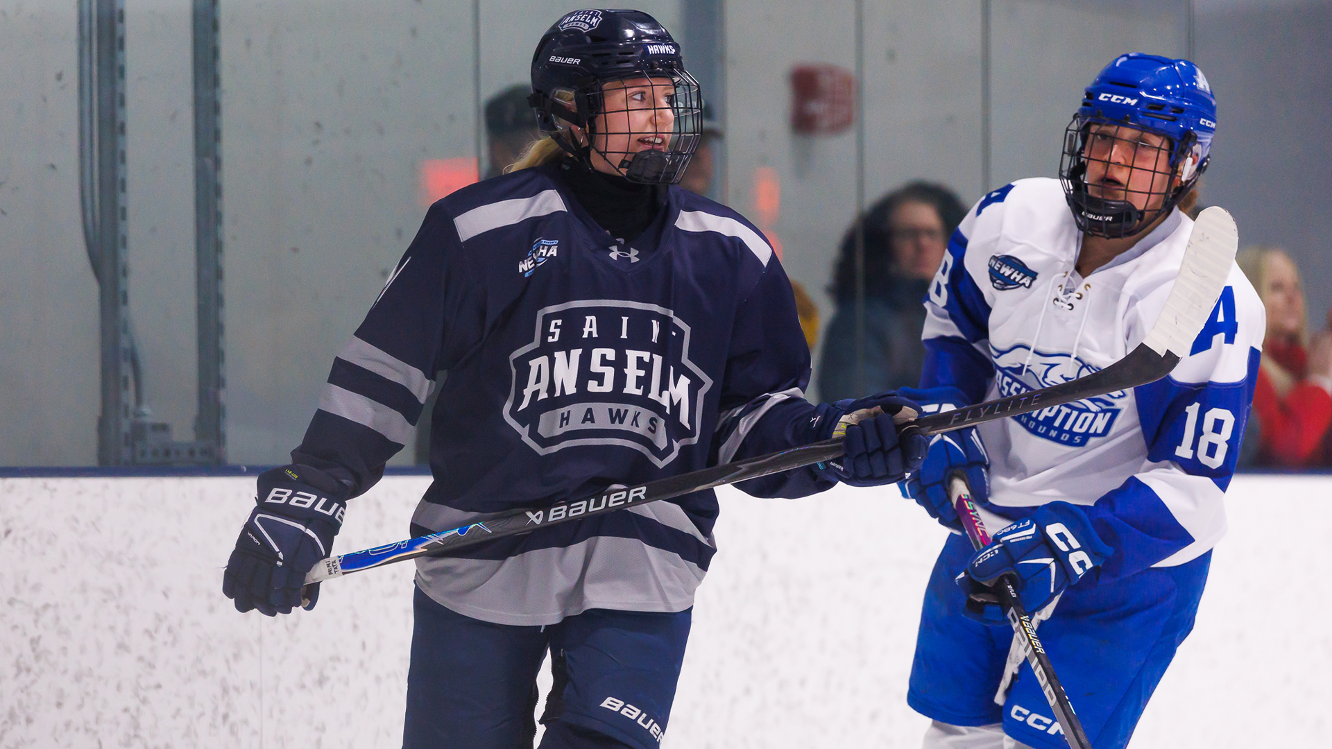 Nicola Forth skating by Assumption player