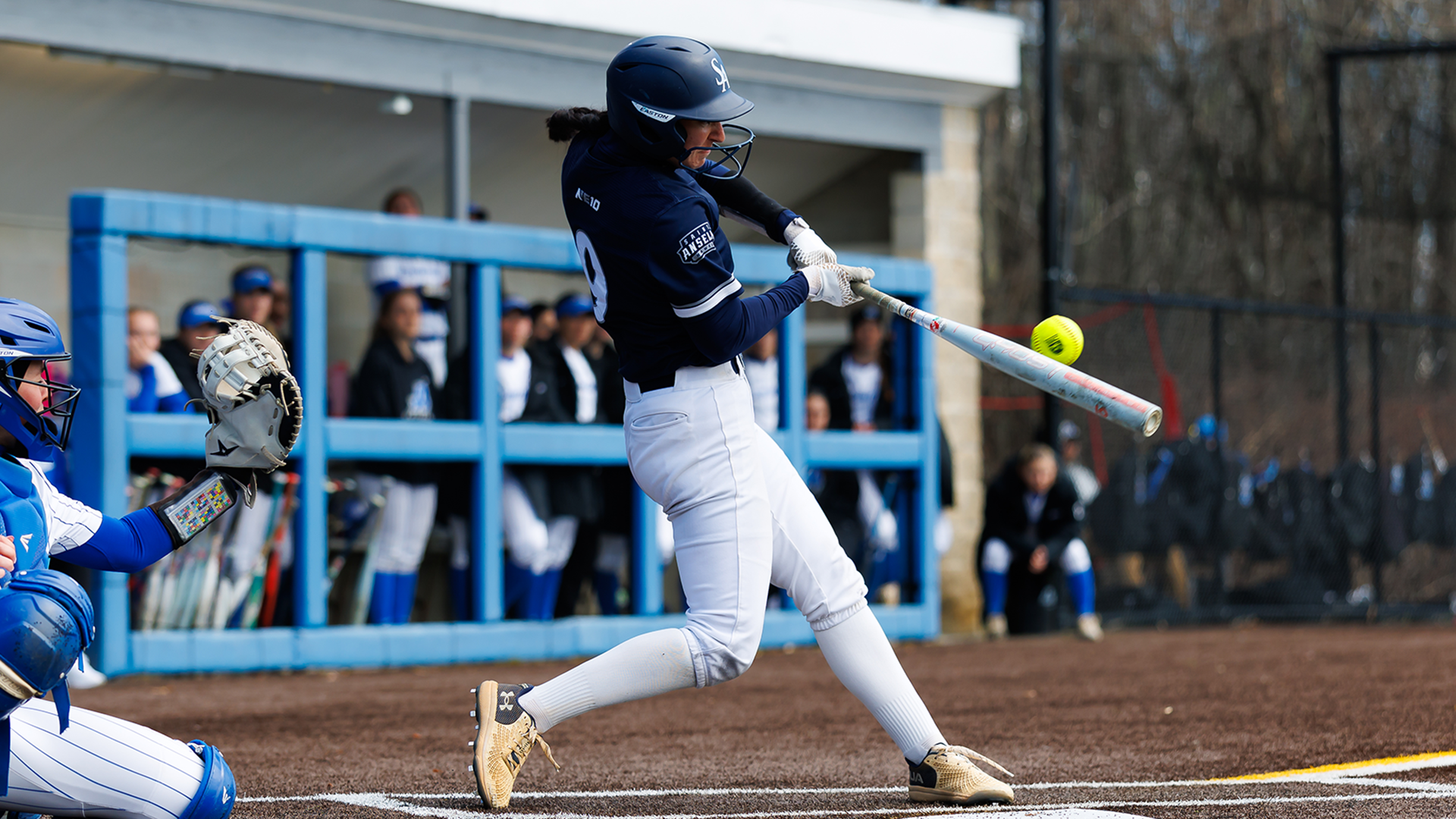Rose Reitmeyer swings the bat against Assumption