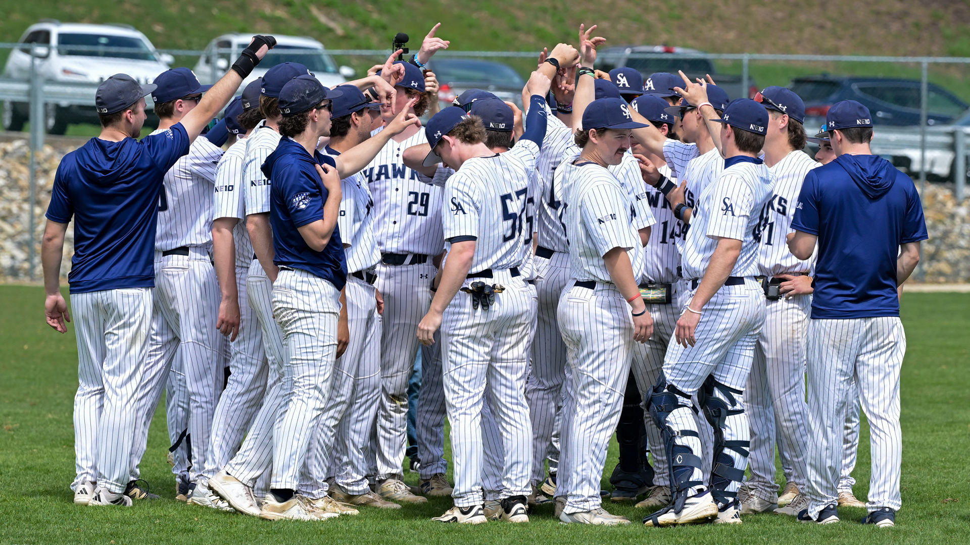 Baseball team huddles pre game