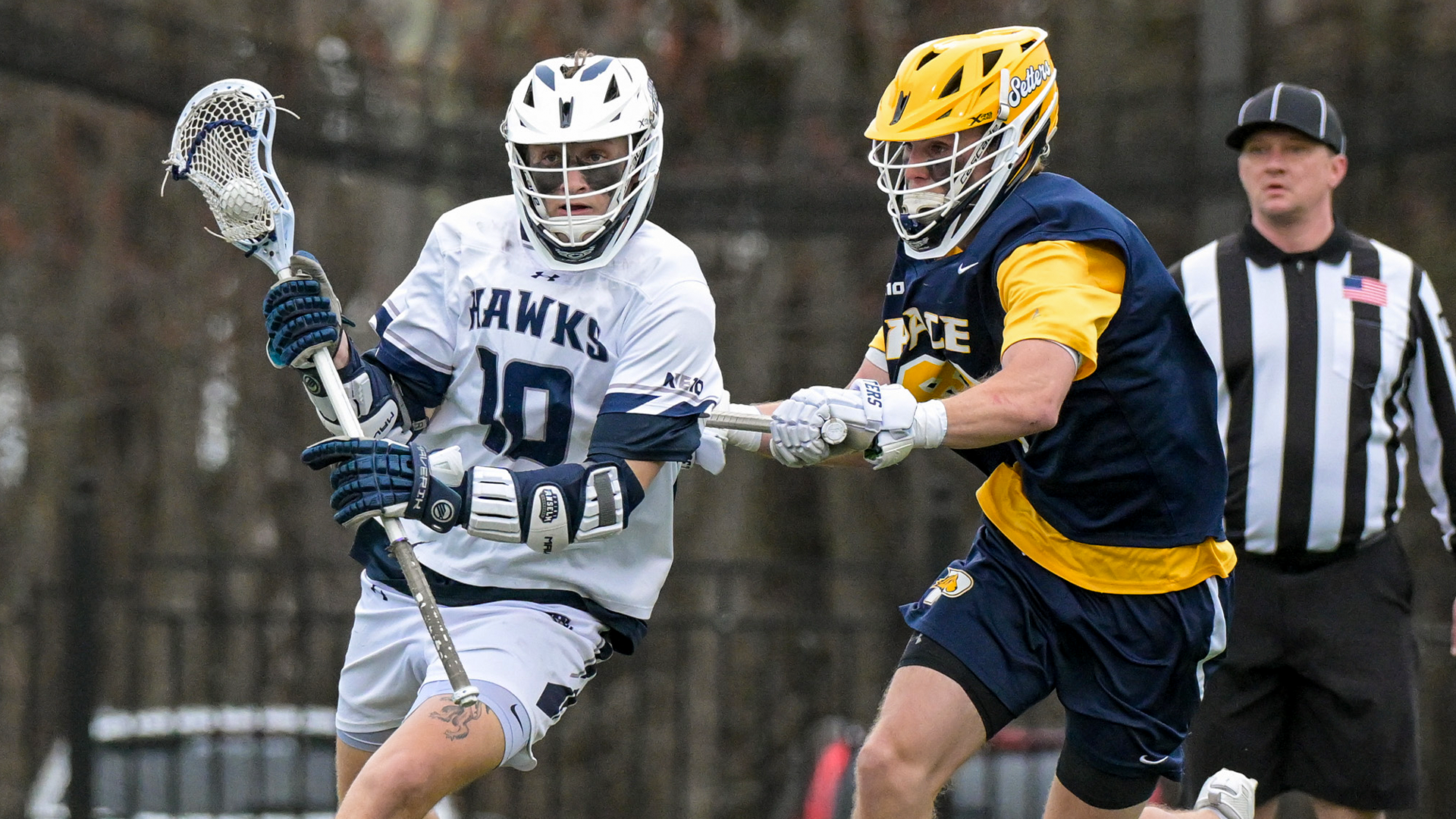 Nick Burns runs past defender