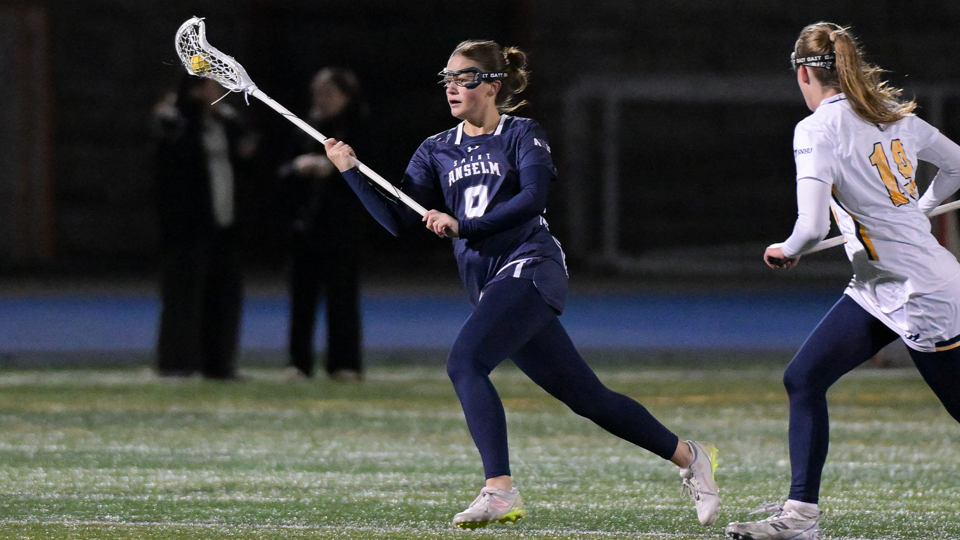 O'Brien runs up field with ball