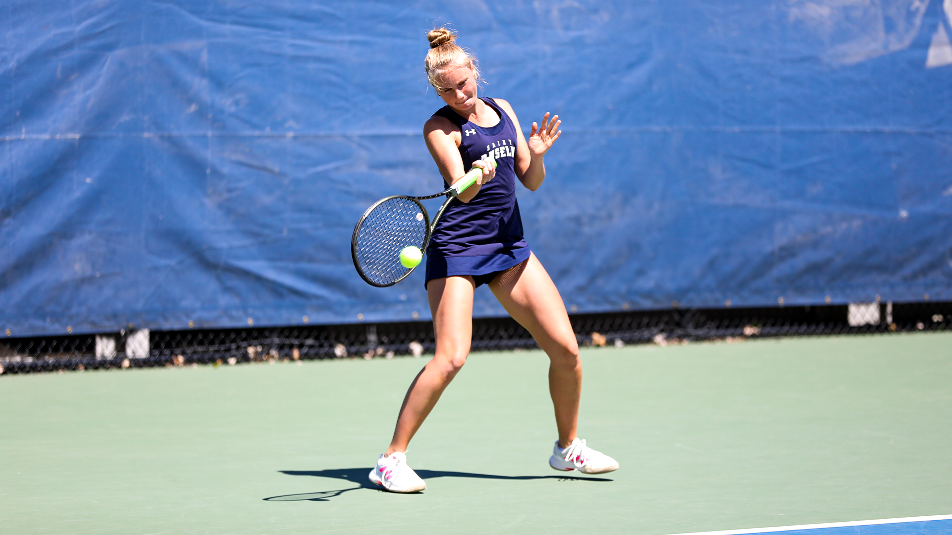 Polina Makarenko volleys ball