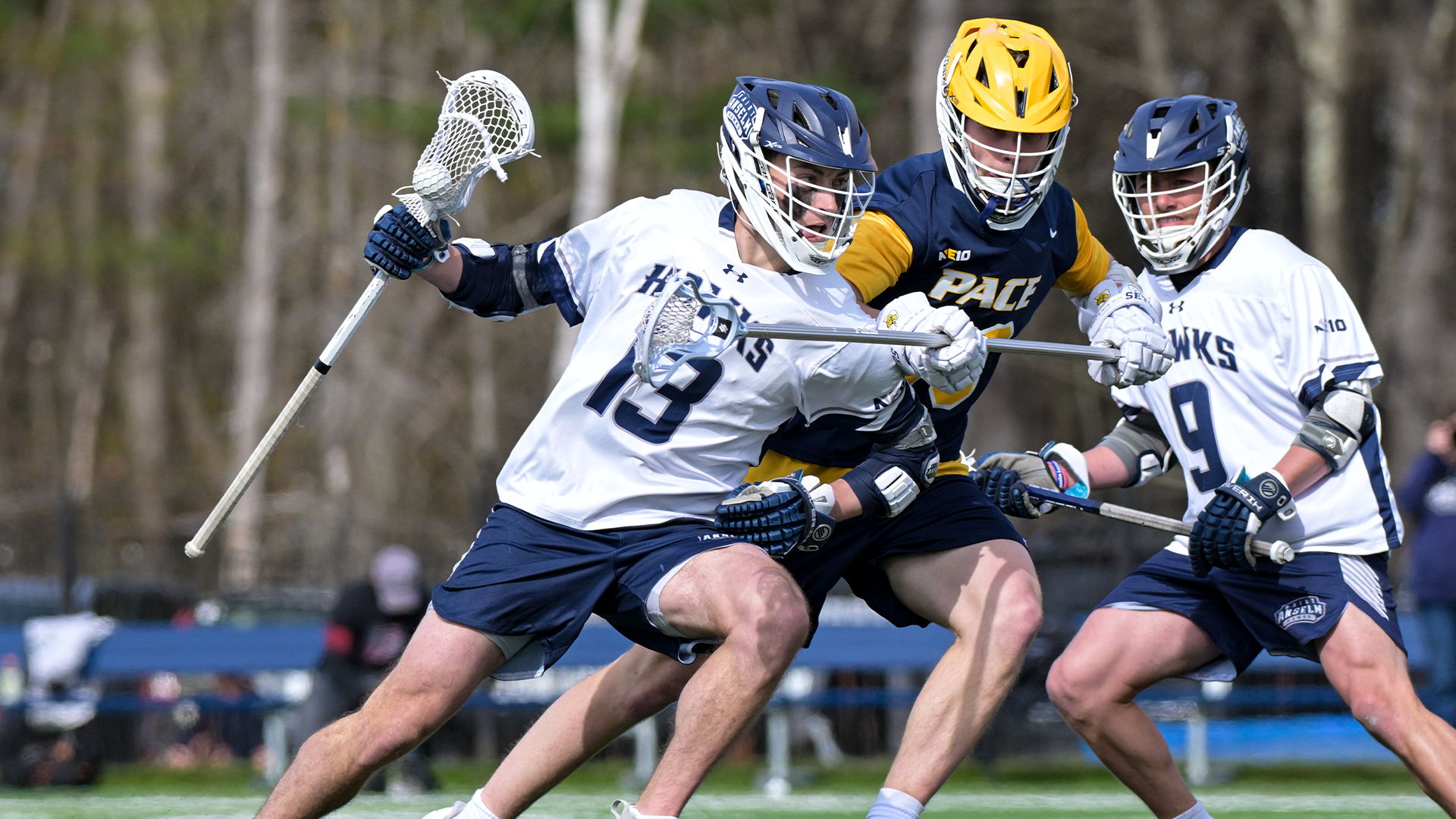 Nathan Alberti shields ball from defender