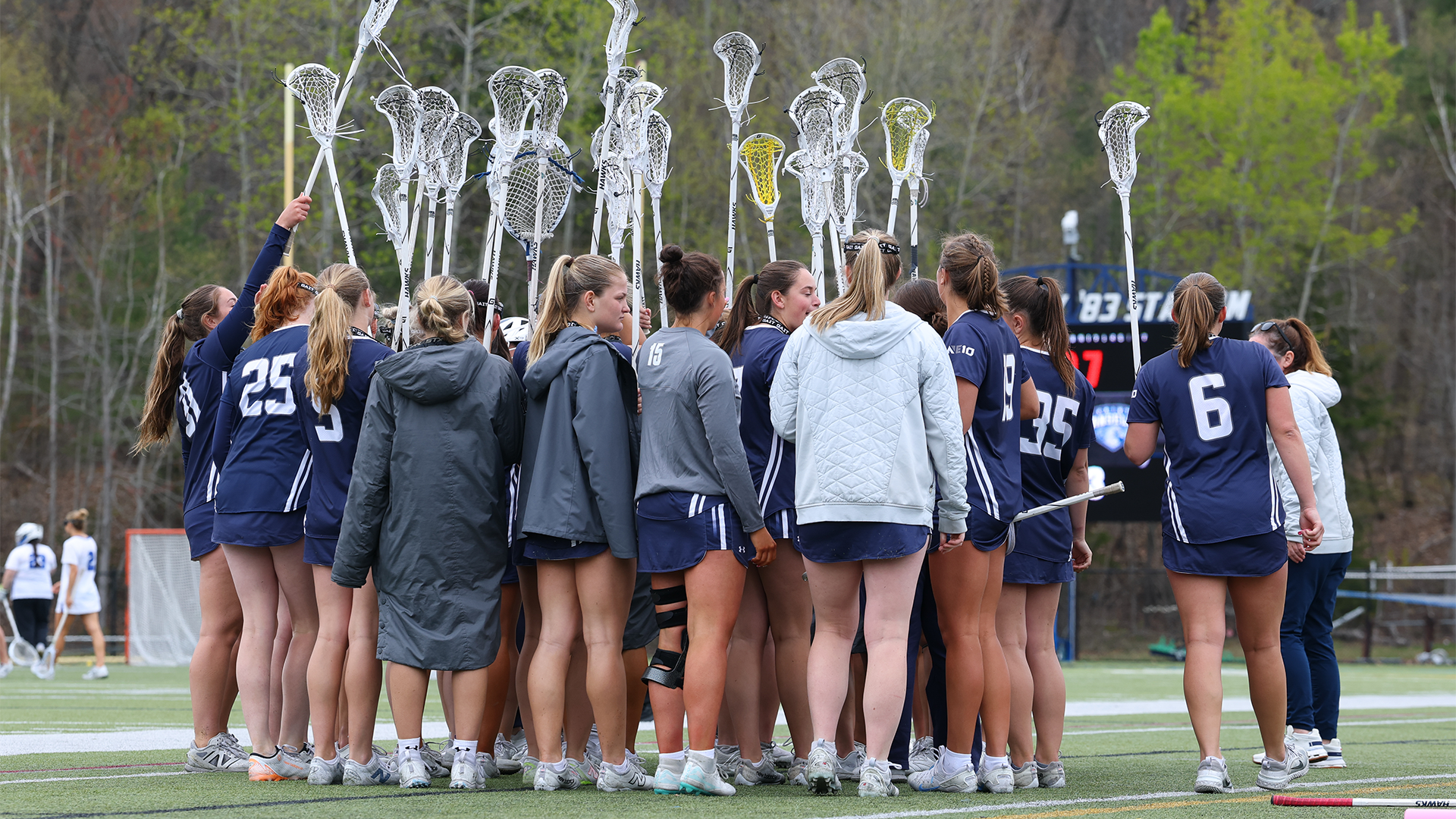 Women's Lacrosse Team Huddles