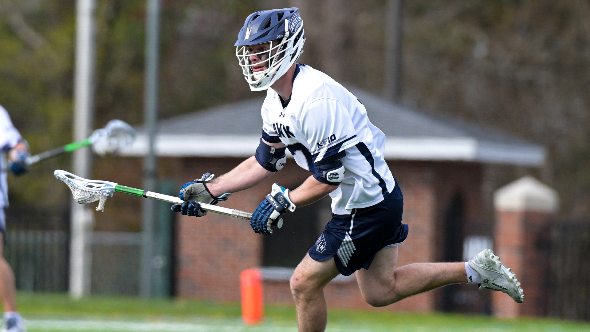 Quinn Gannon runs with ball