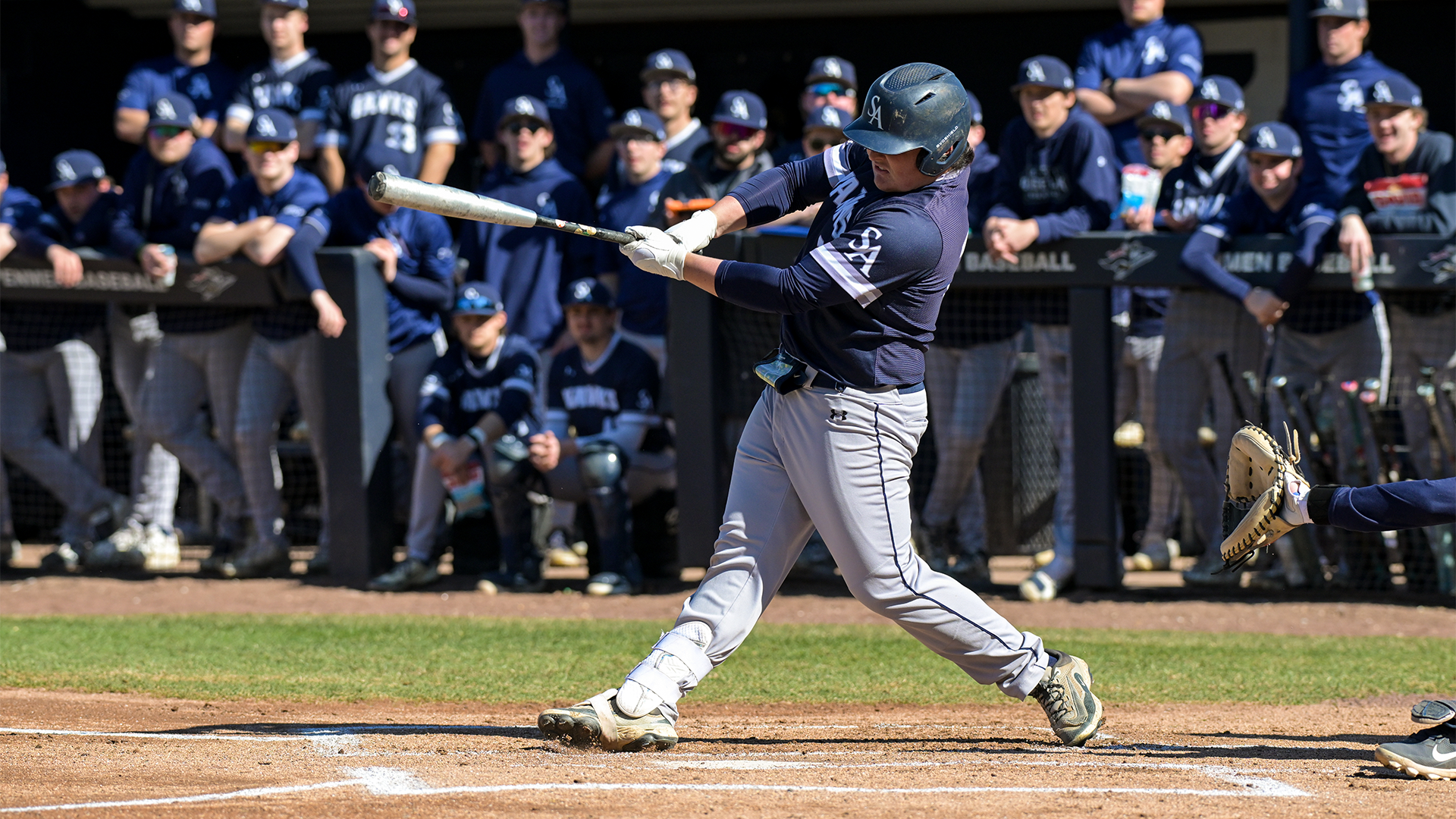 George Slauson swings at pitch