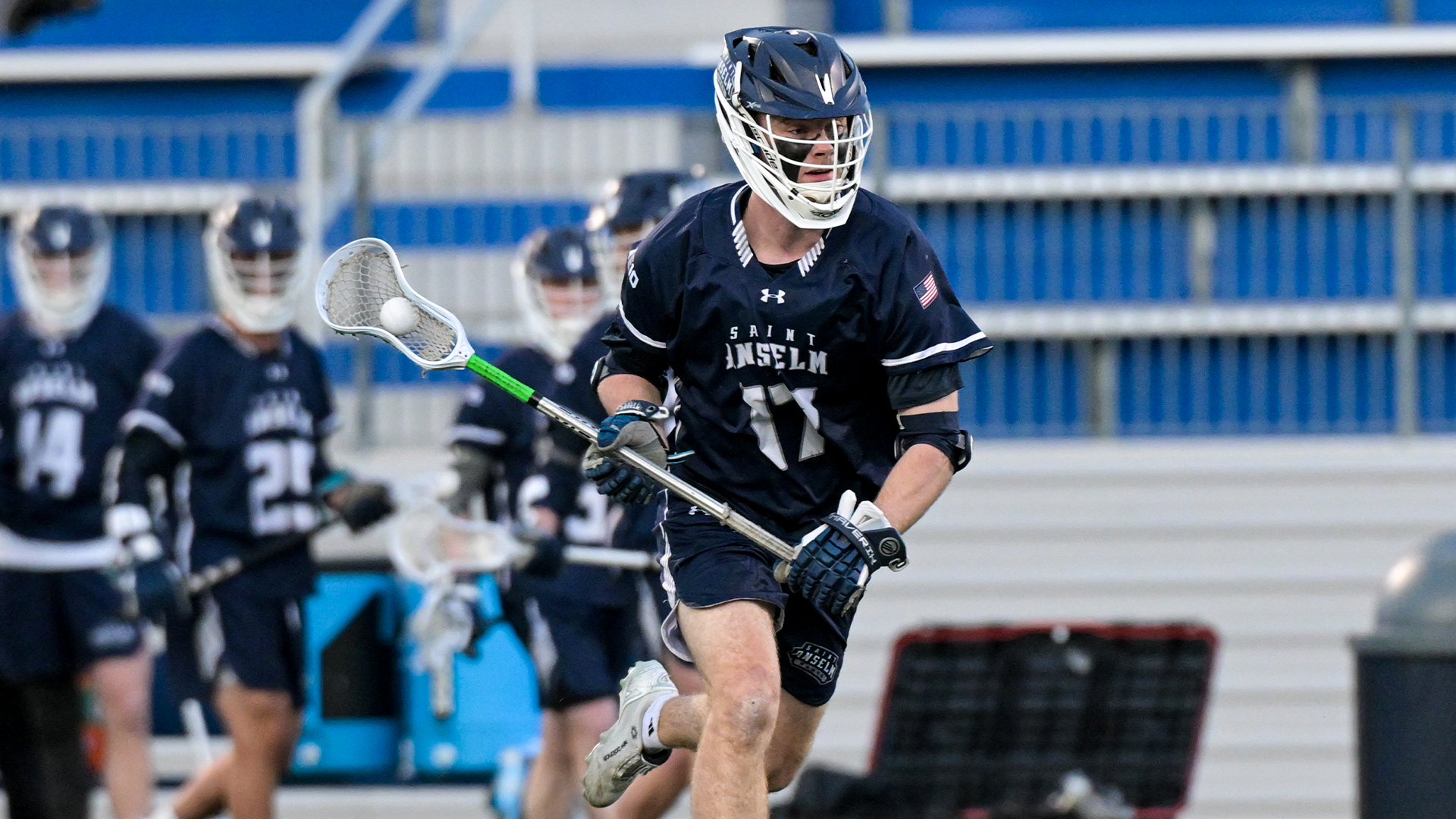 Quinn Gannon runs with ball in his possession