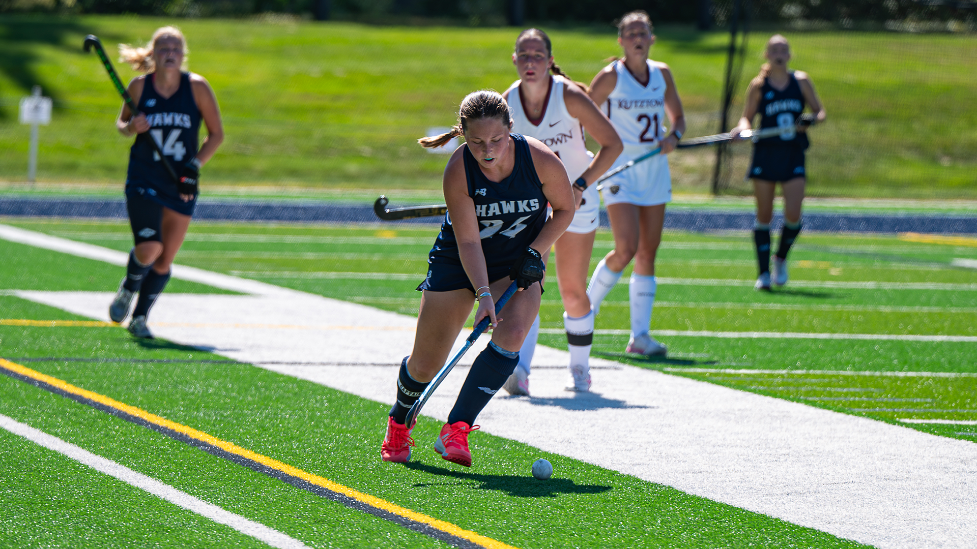 Meghan Smith runs with ball