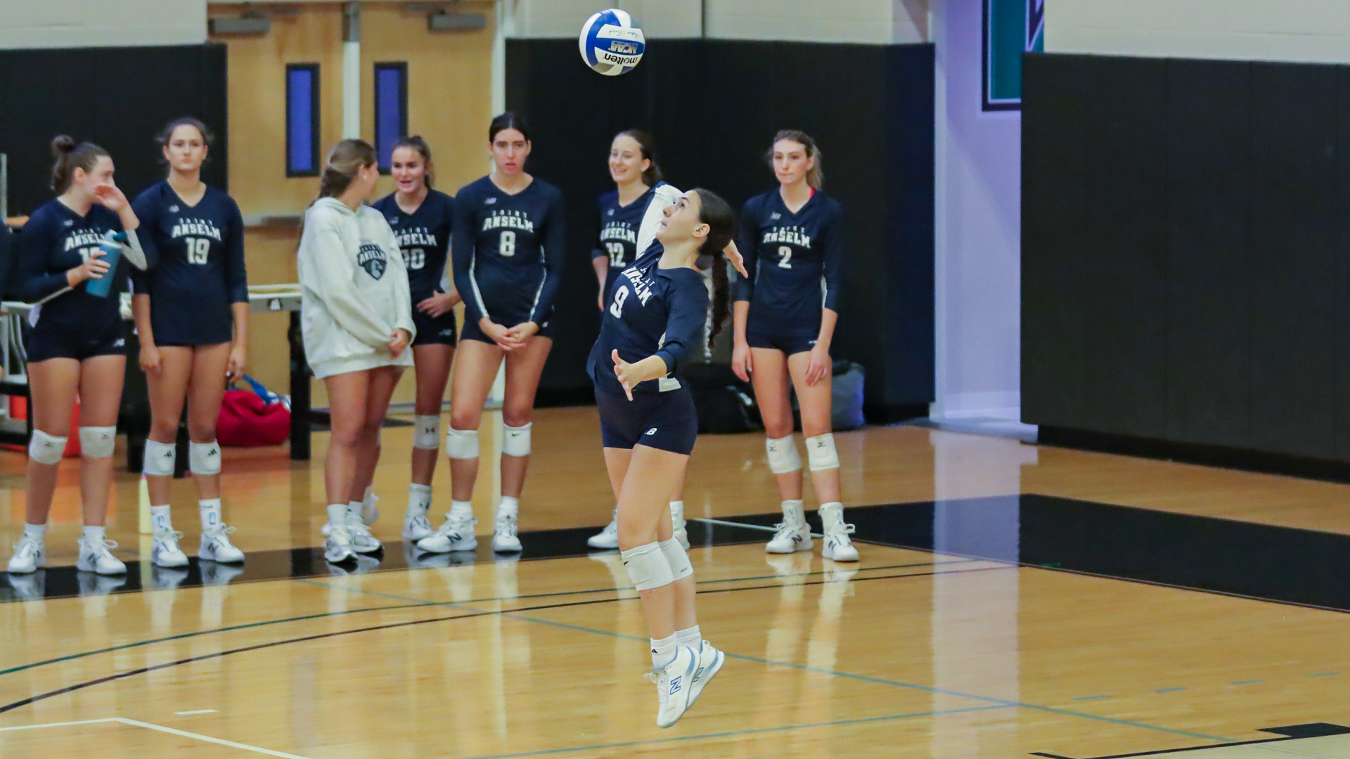 Georgia Stavros serves against Queens