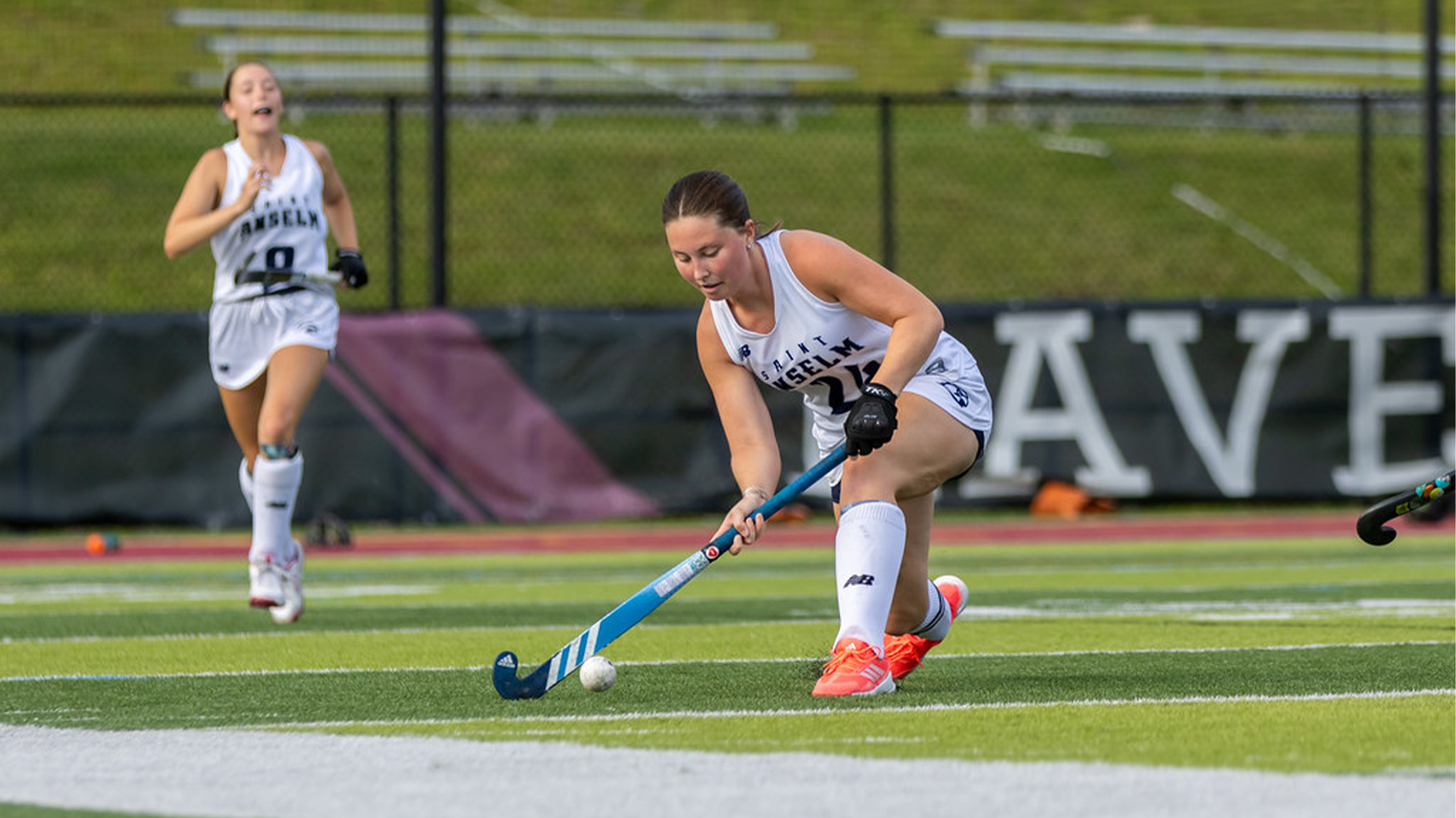 Meghan Smith passes ball up field