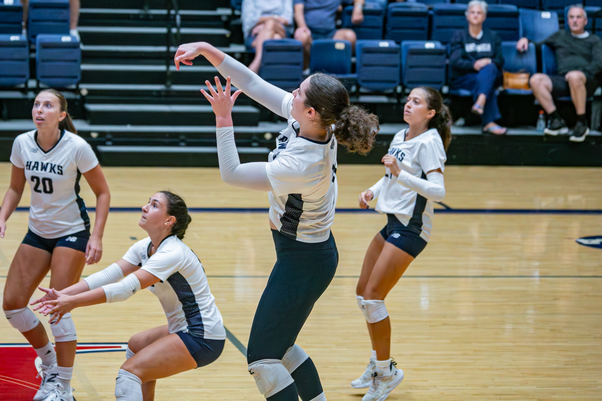 Sam Pila swings for a kill at the King Classic against Newberry