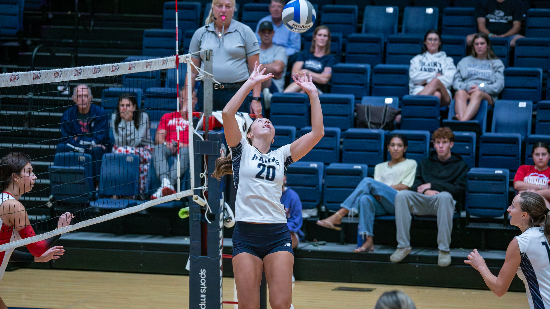 Mckenna O'Connell sets ball against Newberry at King