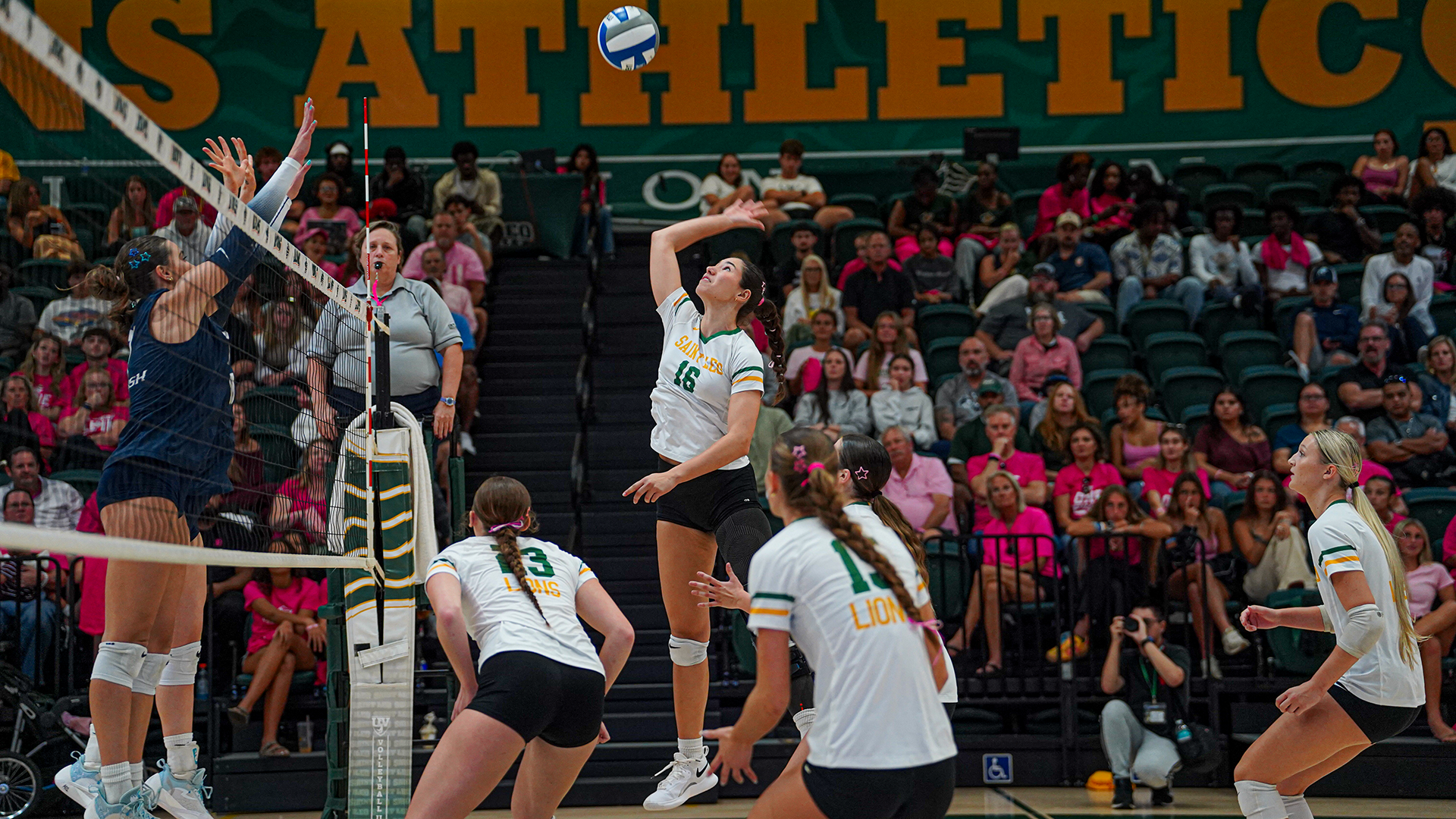 Gina Stavile attacks the ball versus PBA