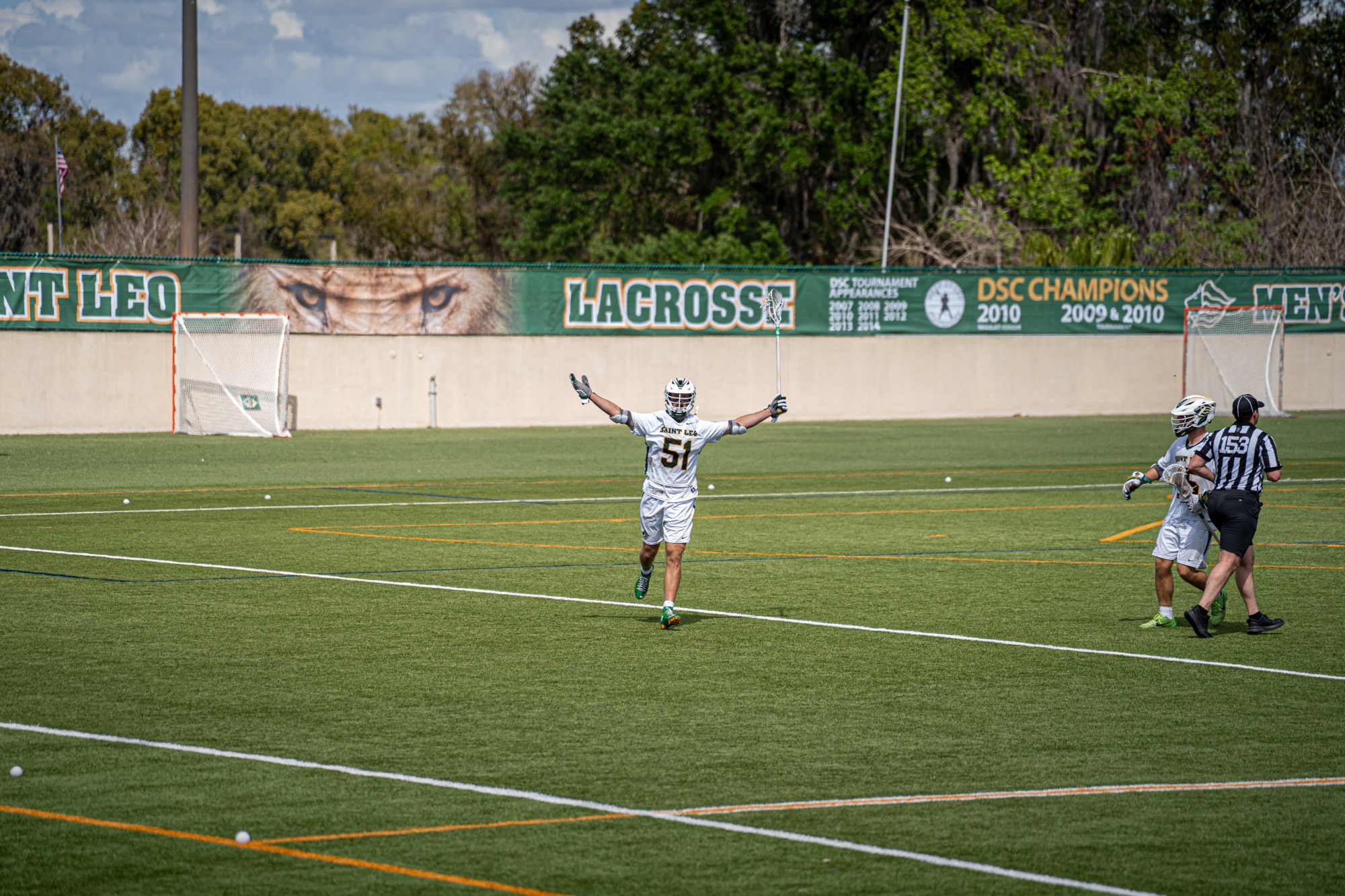 Ben Baker scores a goal and celebrates