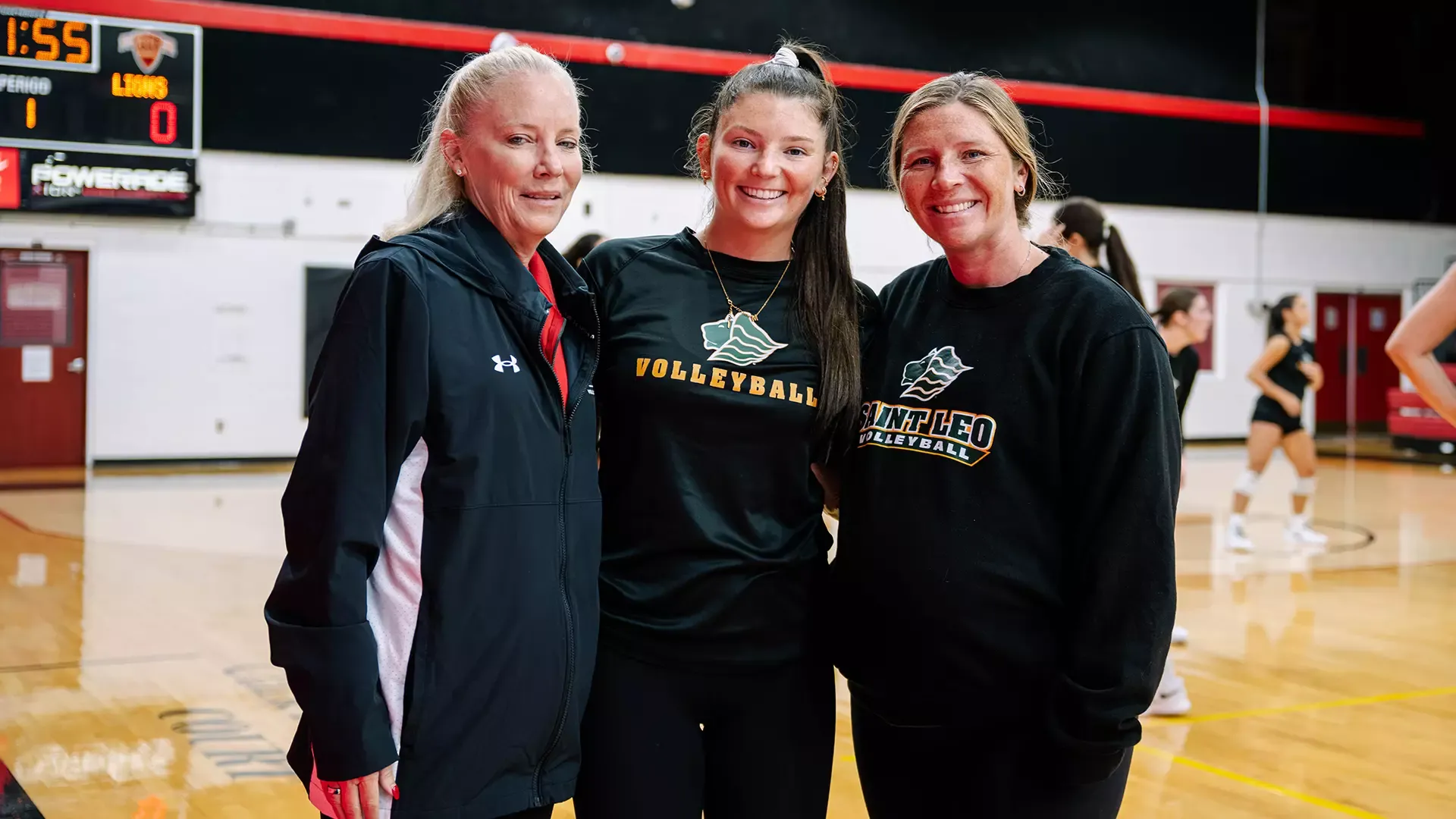 Abby Keim and Mia Moser with their mom Maryville Head Coach Gretchen Moser