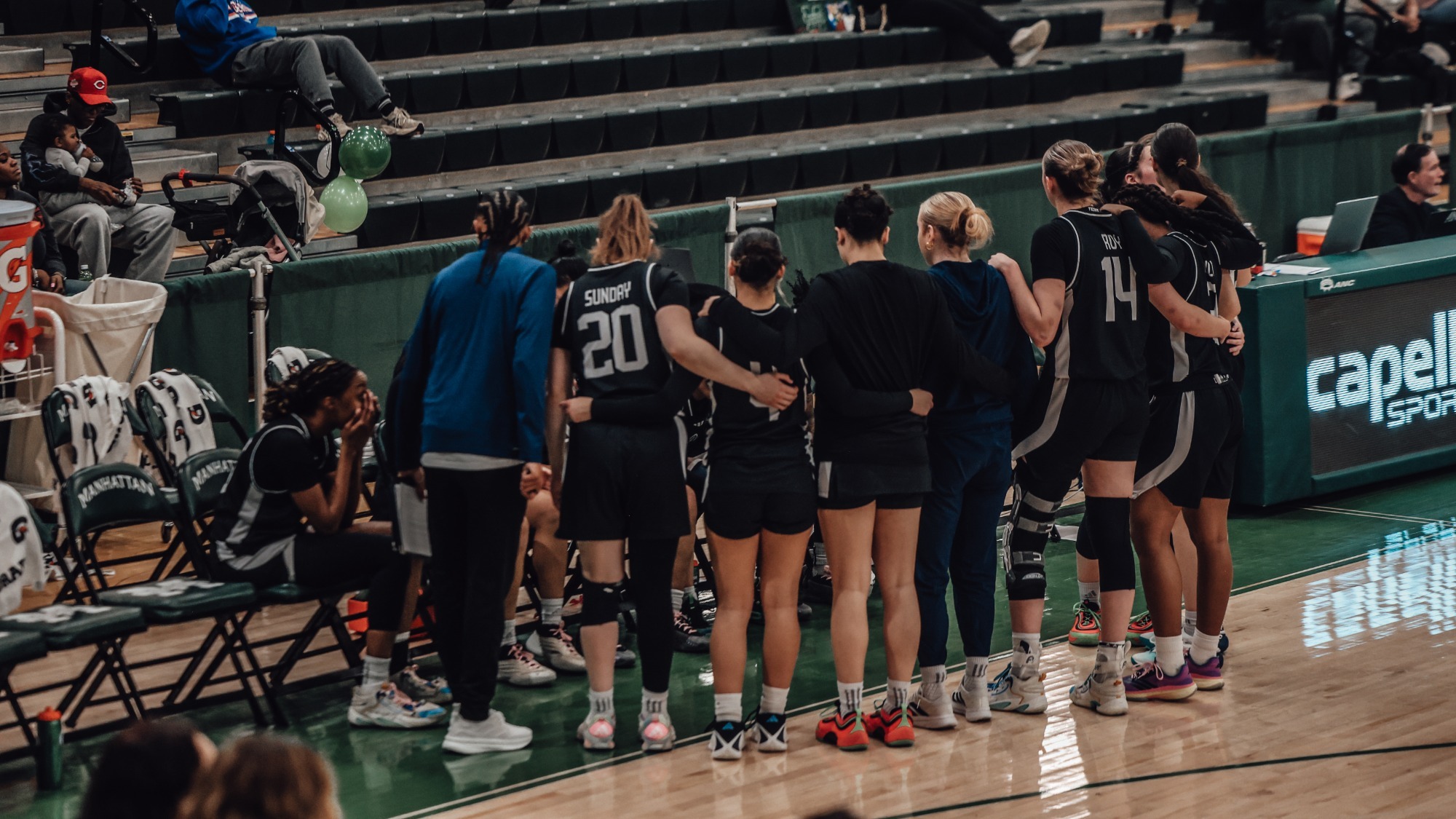 HUDDLE AT MANHATTAN