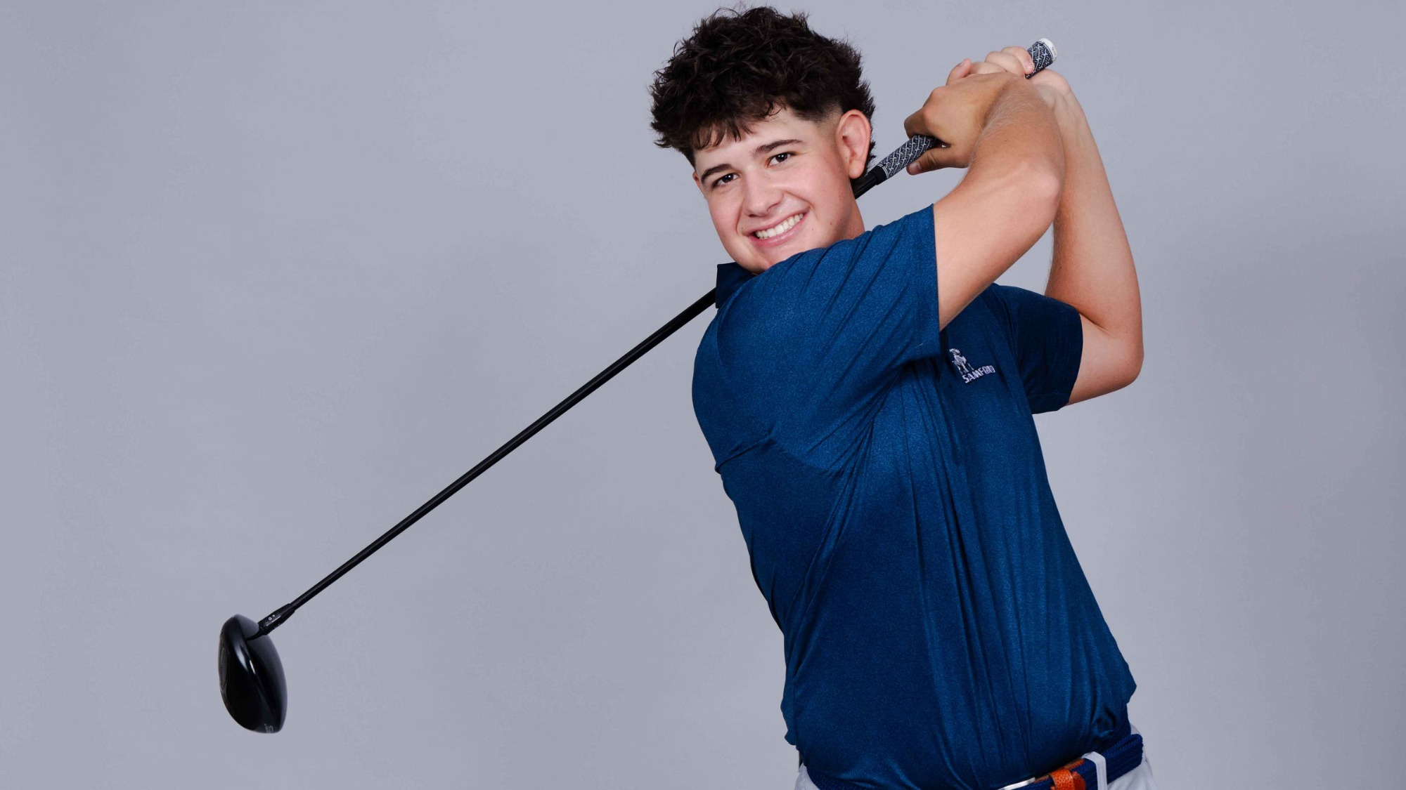 Jack Mikesell posed swinging