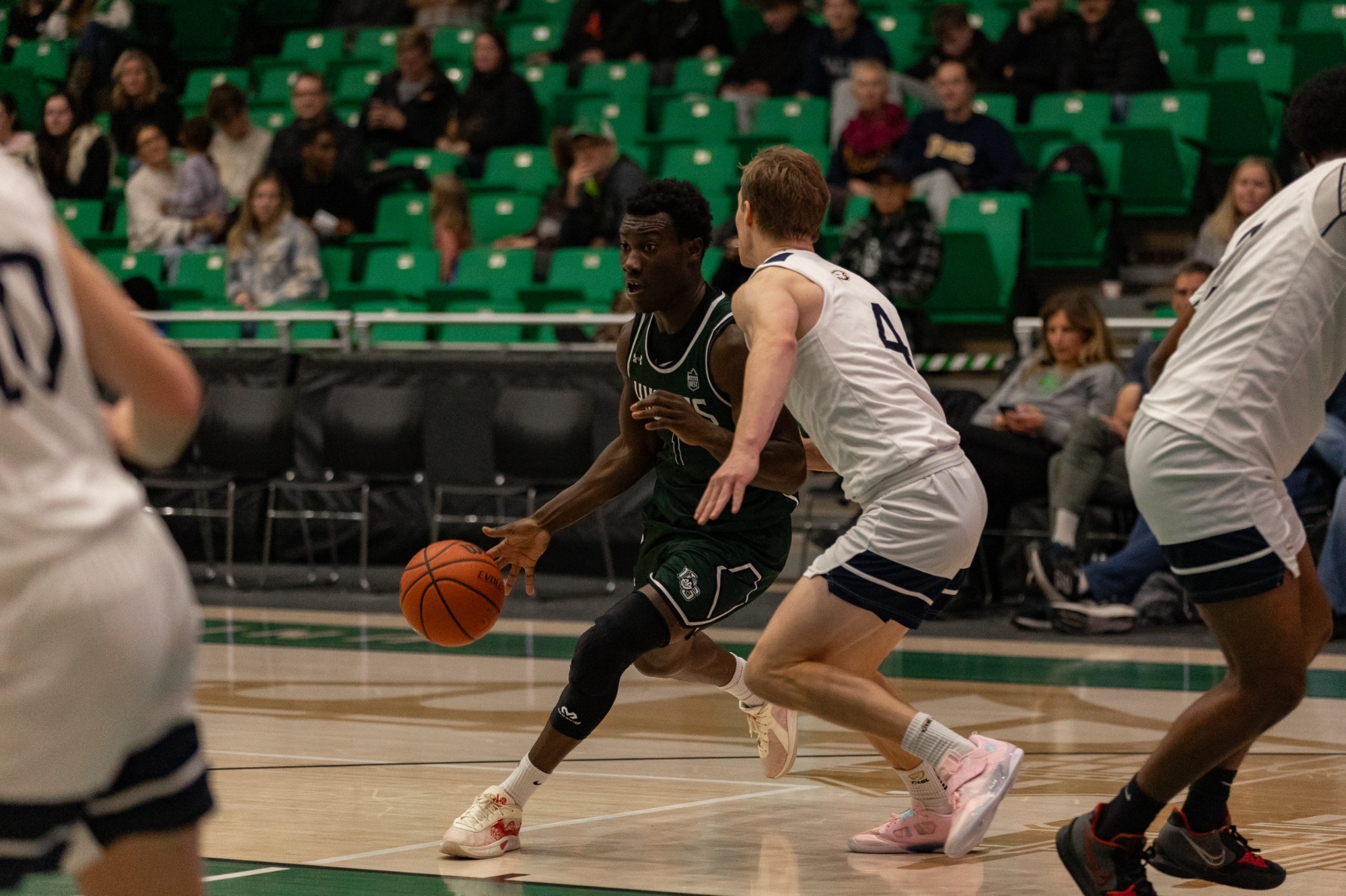 Bonsu drives to the hoop against UBC defender