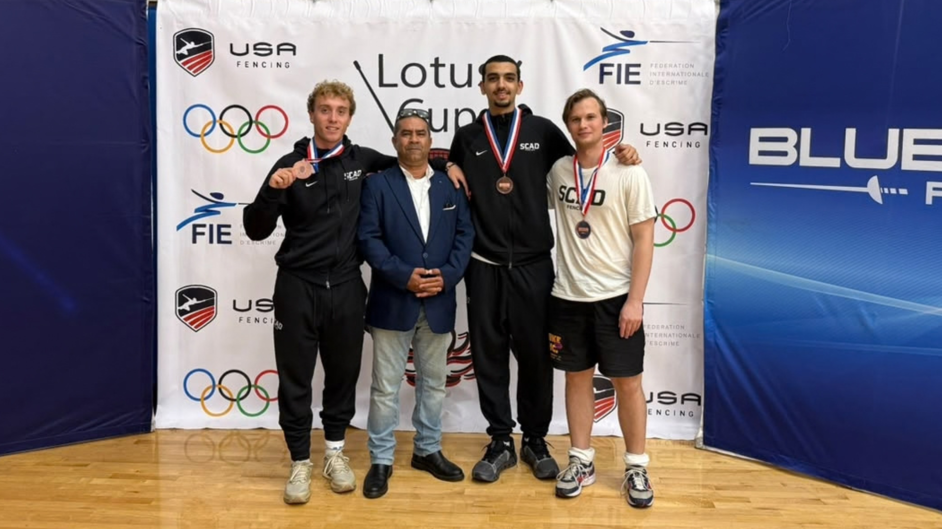 Self, Gregorio and Anton pose with Head Coach Walid Mahran.