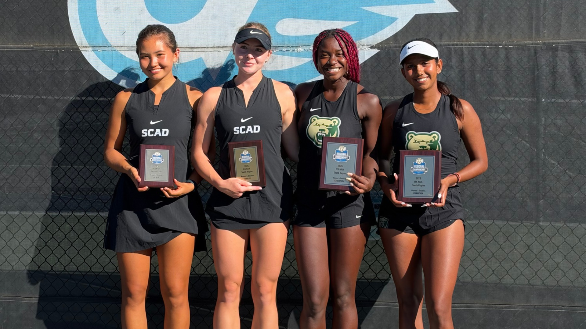 Adrianna Kluska and Asia Liverani pose with awards.
